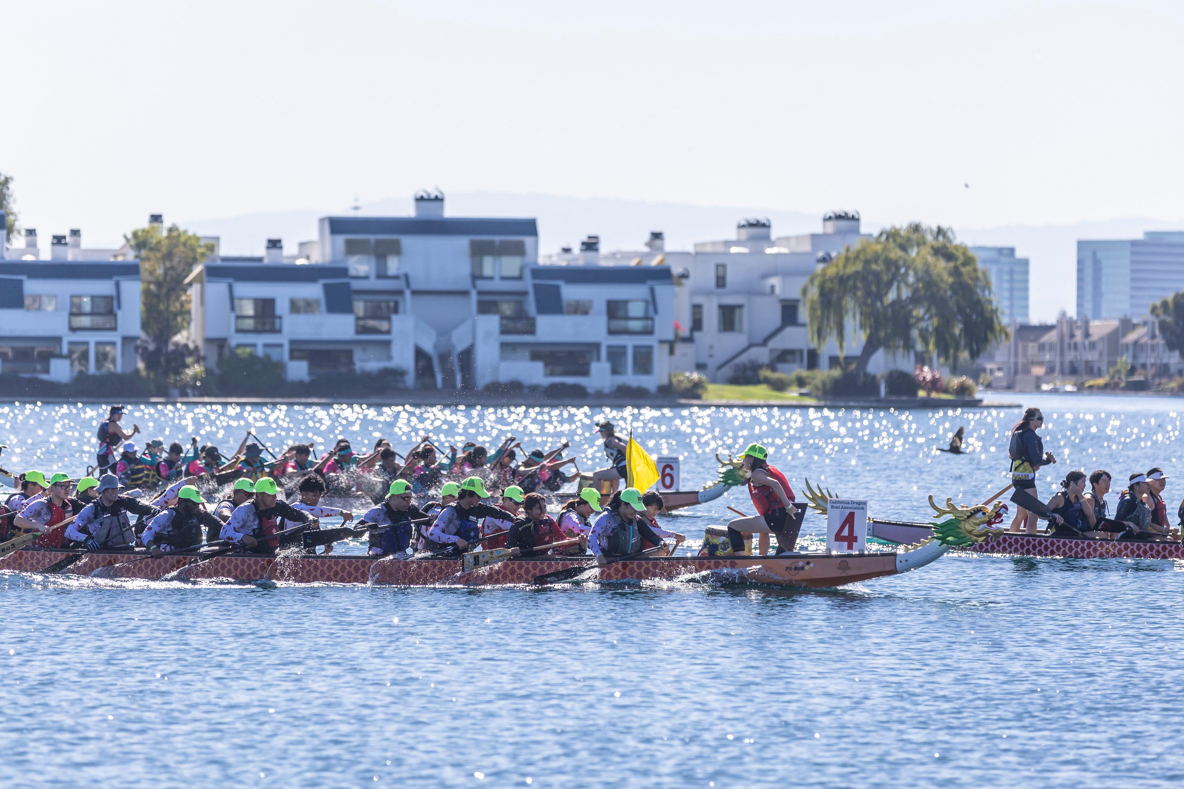 The Hong Kong Economic and Trade Office in San Francisco participated in the Northern California Dragon Boat Festival in Foster City, California, October 19 and 20, 2024 (Foster City Time). Photo shows athletes competing in a dragon boat race.