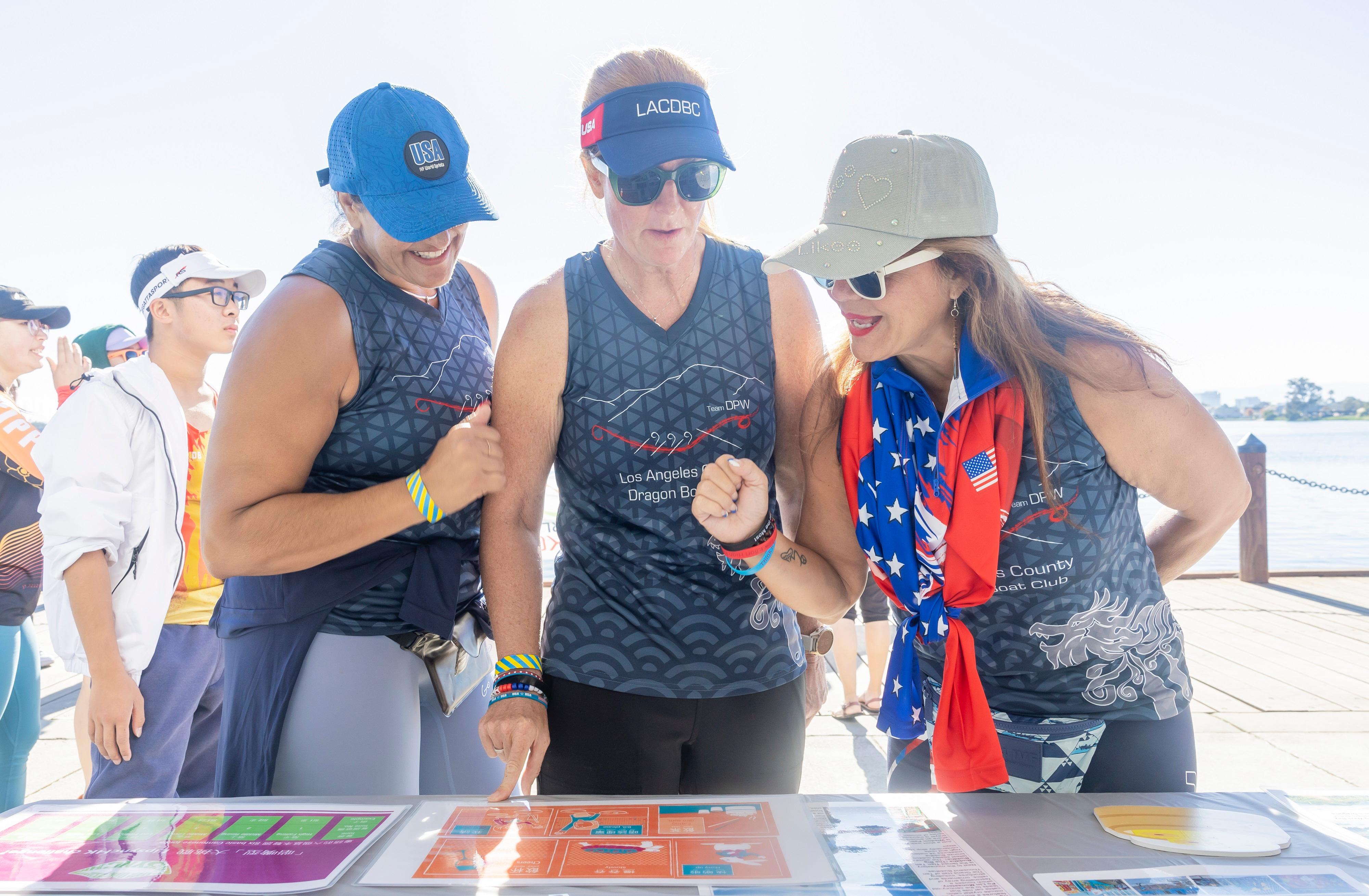 The Hong Kong Economic and Trade Office in San Francisco (HKETO San Francisco) participated in the Northern California Dragon Boat Festival in Foster City, California, October 19 and 20, 2024 (Foster City Time). Photo shows visitors at the HKETO San Francisco booth participating in a lip-sync challenge.