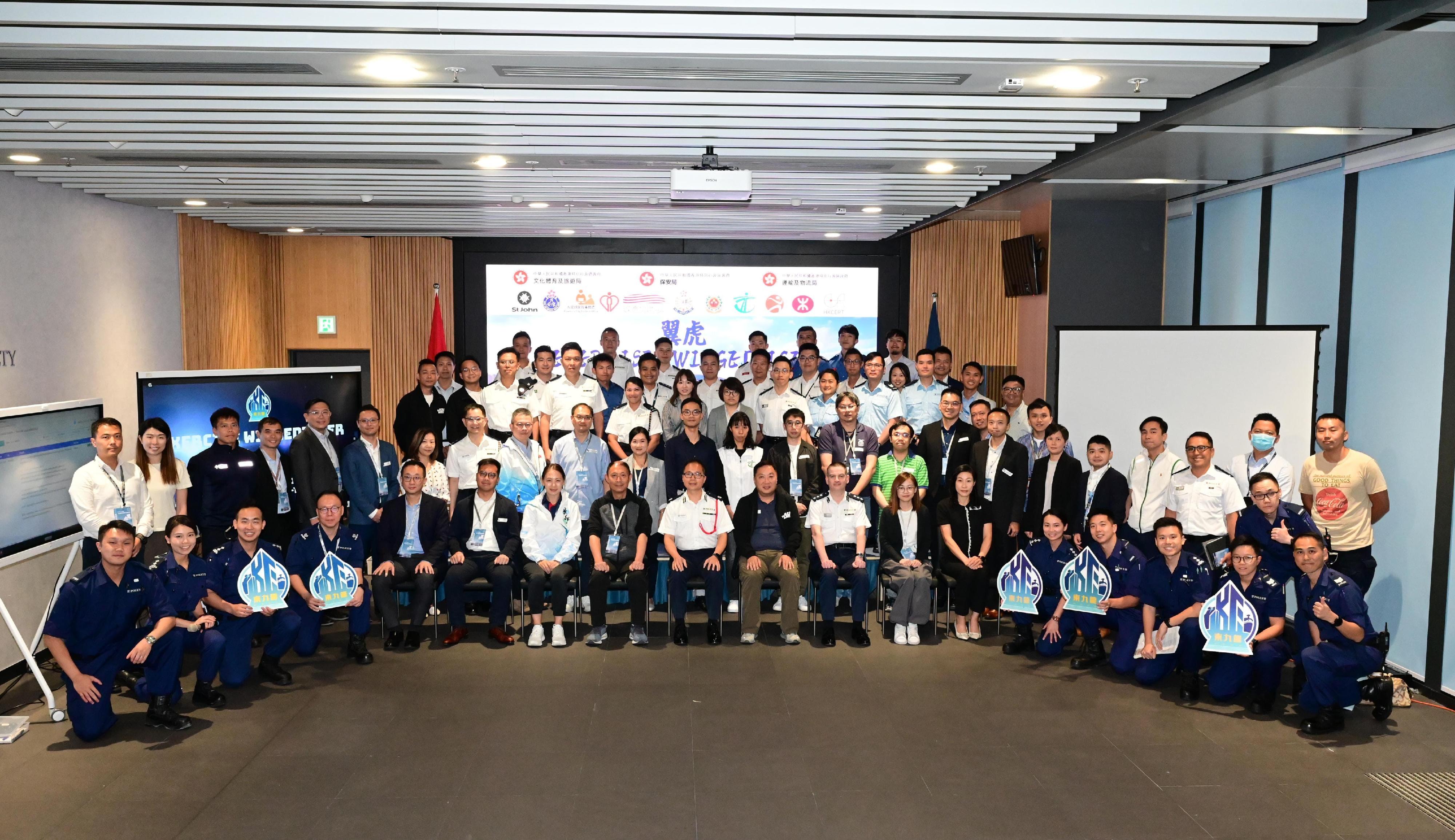 The Kowloon East Region of the Hong Kong Police Force held the first inter-departmental tabletop exercise for the Kai Tak Sports Park at the Kowloon East Regional Headquarters yesterday (October 25). Photo shows the Regional Commander of Kowloon East, Dr Law Yuet-wing (first row, ninth left), picturing with representatives from various government departments and related organisations.