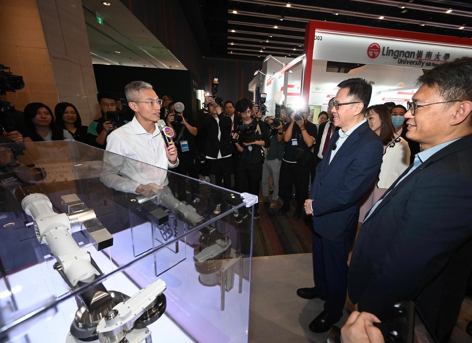 InnoCarnival 2024, organised by the Innovation and Technology Commission, is being held from today (October 26) to November 3 at the Hong Kong Science Park. Photo shows the Secretary for Innovation, Technology and Industry, Professor Sun Dong (second right), visiting the exhibition booth of the Hong Kong Polytechnic University.