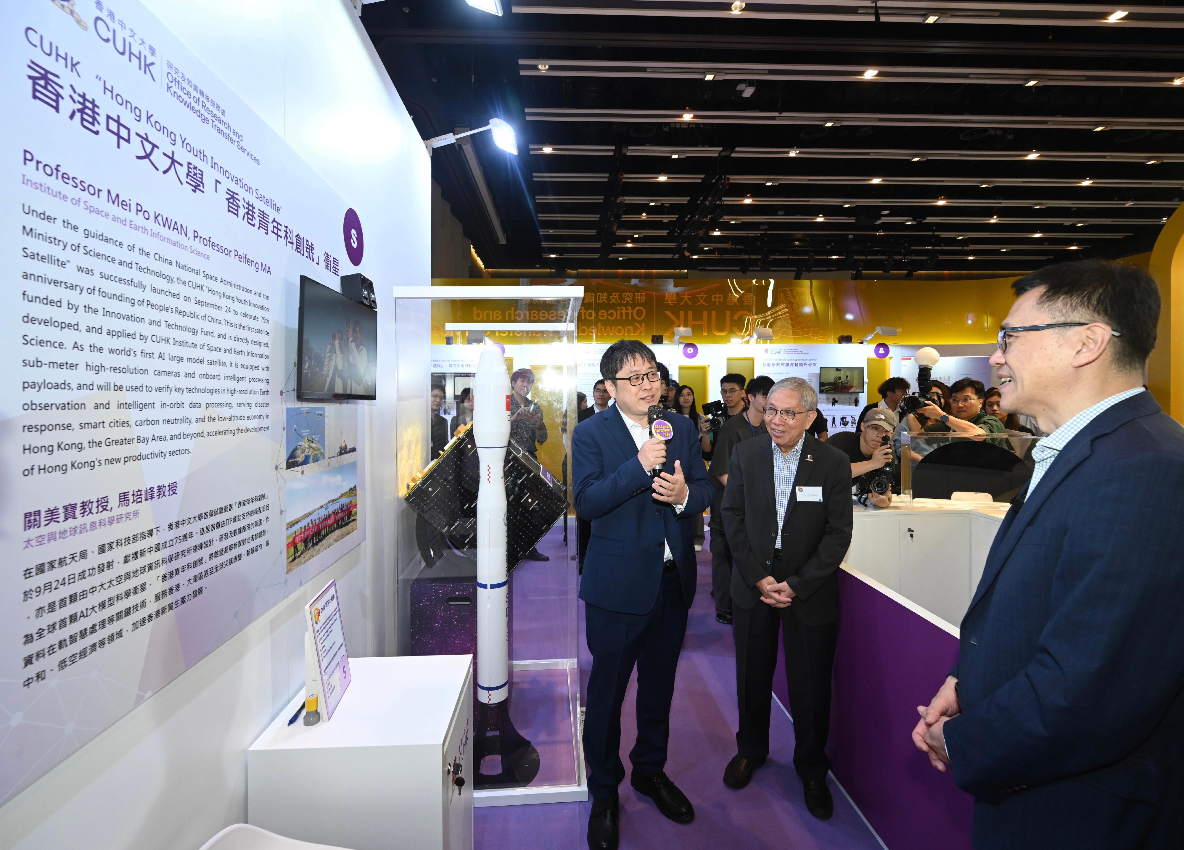 InnoCarnival 2024, organised by the Innovation and Technology Commission, is being held from today (October 26) to November 3 at the Hong Kong Science Park. Photo shows the Secretary for Innovation, Technology and Industry, Professor Sun Dong (first right), visiting the exhibition booth of the Chinese University of Hong Kong.