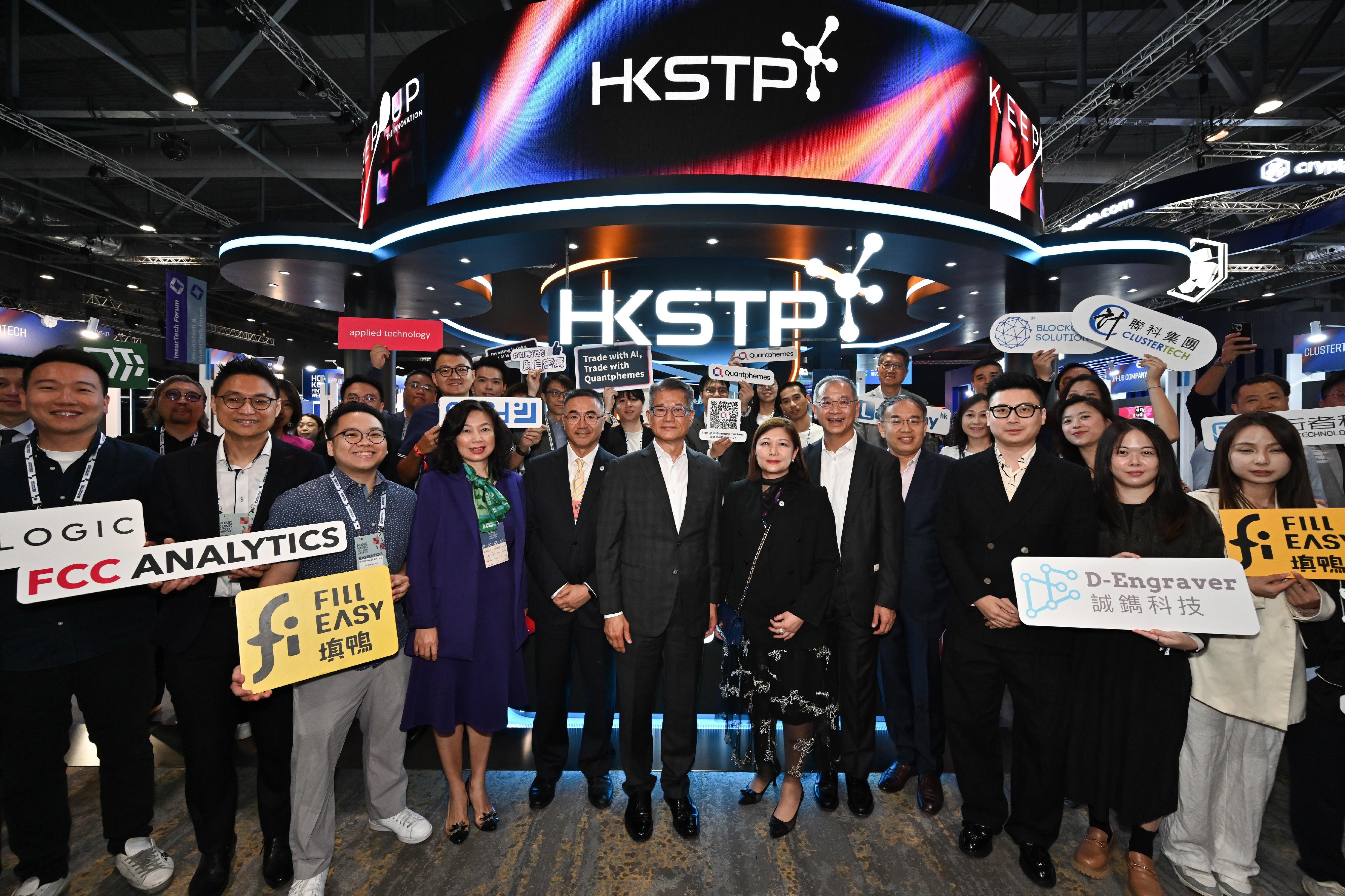 The Financial Secretary, Mr Paul Chan, attended Hong Kong FinTech Week 2024 today (October 28). Photo shows Mr Chan (first row, sixth left); the Secretary for Financial Services and the Treasury, Mr Christopher Hui (first row, fourth right); and the Permanent Secretary for Financial Services and the Treasury (Financial Services), Ms Salina Yan (first row, fourth left), with other guests and participants.