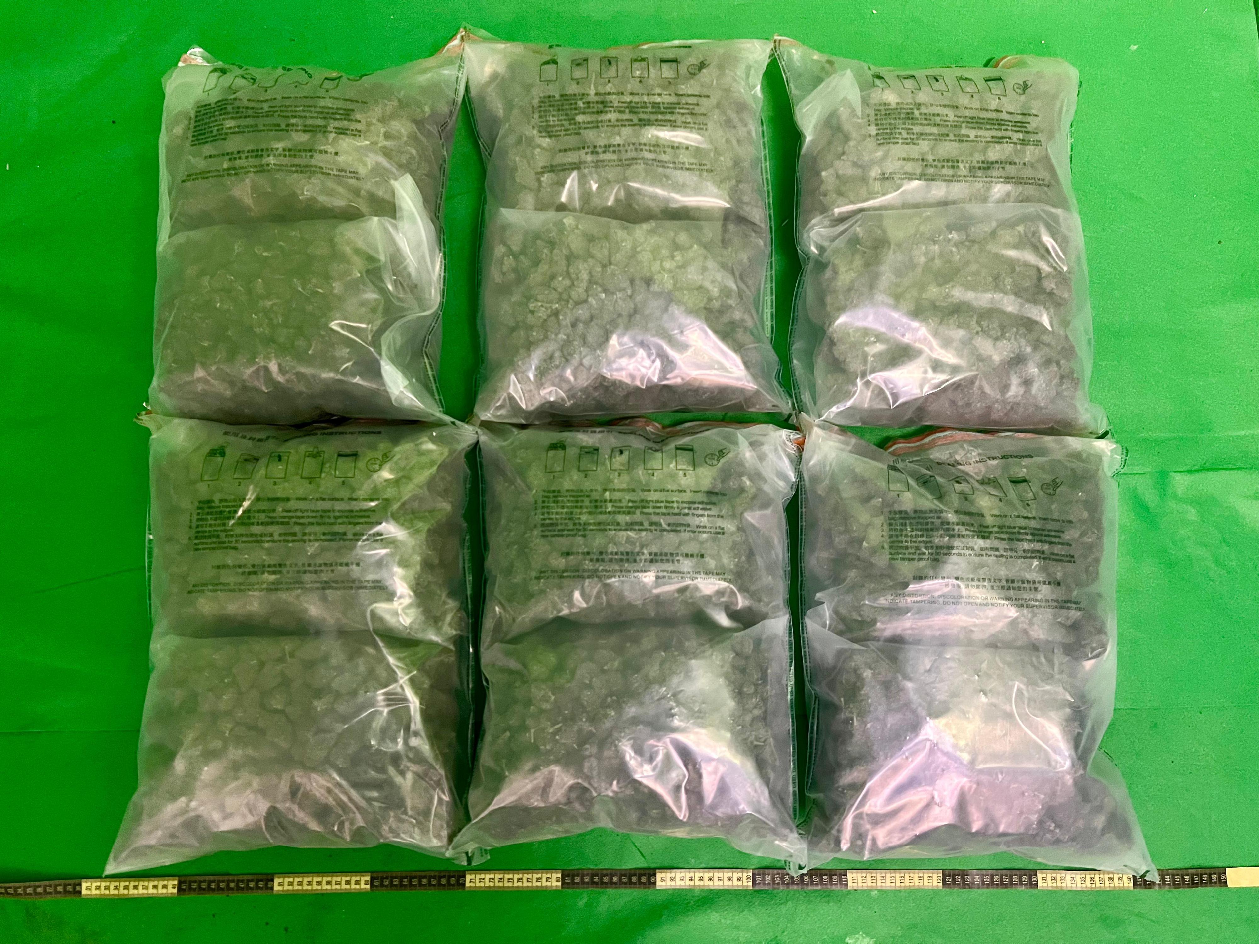 Hong Kong Customs yesterday (October 27) detected a drug trafficking case involving baggage concealment at Hong Kong International Airport and seized about 10 kilograms of suspected cannabis buds with an estimated market value of about $1.9 million. Photo shows the suspected cannabis buds seized.