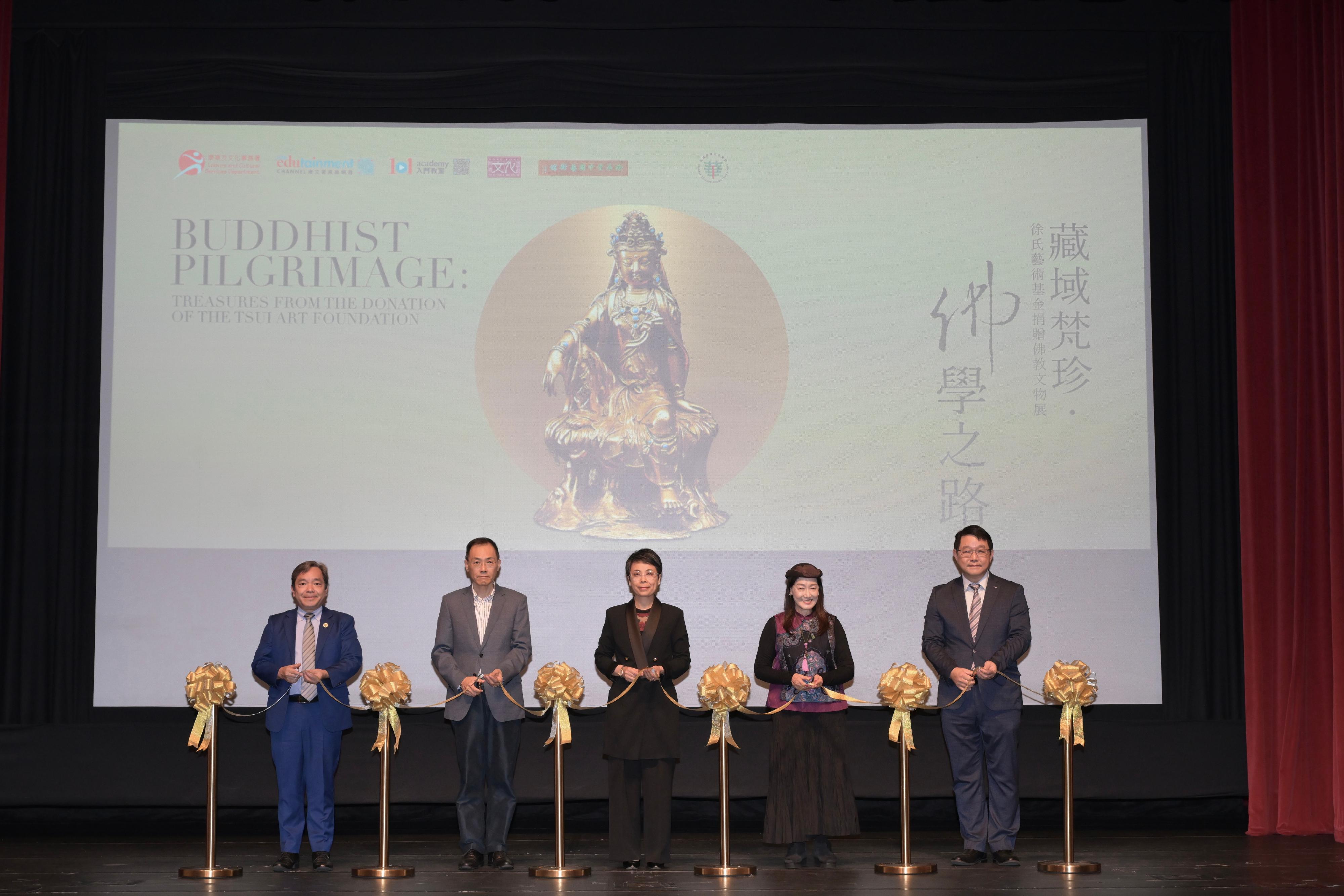 The opening ceremony of the exhibition "Buddhist Pilgrimage: Treasures from the Donation of The Tsui Art Foundation" was held today (October 29) at the Hong Kong Heritage Museum (HKHM). Photo shows the Acting Director of Leisure and Cultural Services, Miss Eve Tam (centre);      representatives of the Tsui Art Foundation, Mr Tsui Ho-chuen (second left) and Ms Tsui Ching-ming (second right); the Chairman of the History Sub-committee of the Museum Advisory Committee, Professor Joshua Mok (first left); and the Museum Director of the HKHM, Mr Brian Lam (first right), officiating at the ceremony.