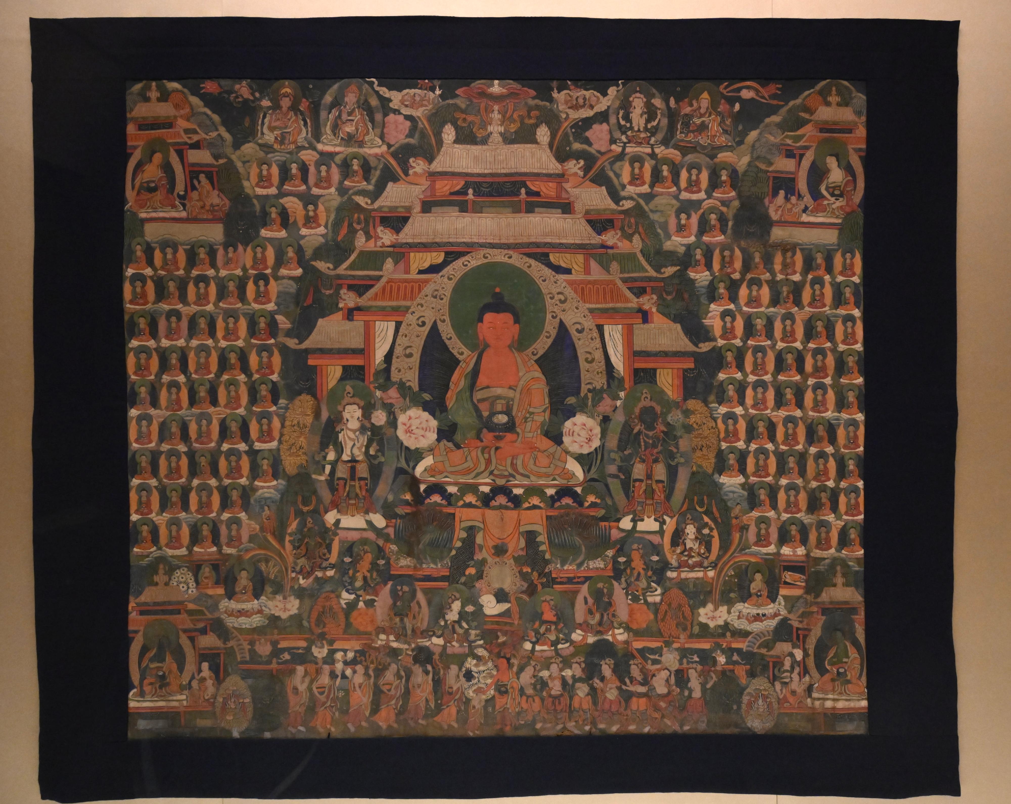 The opening ceremony of the exhibition "Buddhist Pilgrimage: Treasures from the Donation of The Tsui Art Foundation" was held today (October 29) at the Hong Kong Heritage Museum. Photo shows thangka "Amitābha", which portrays the main deity Amitābha in the centre and being surrounded by the Eight Great Bodhisattvas.