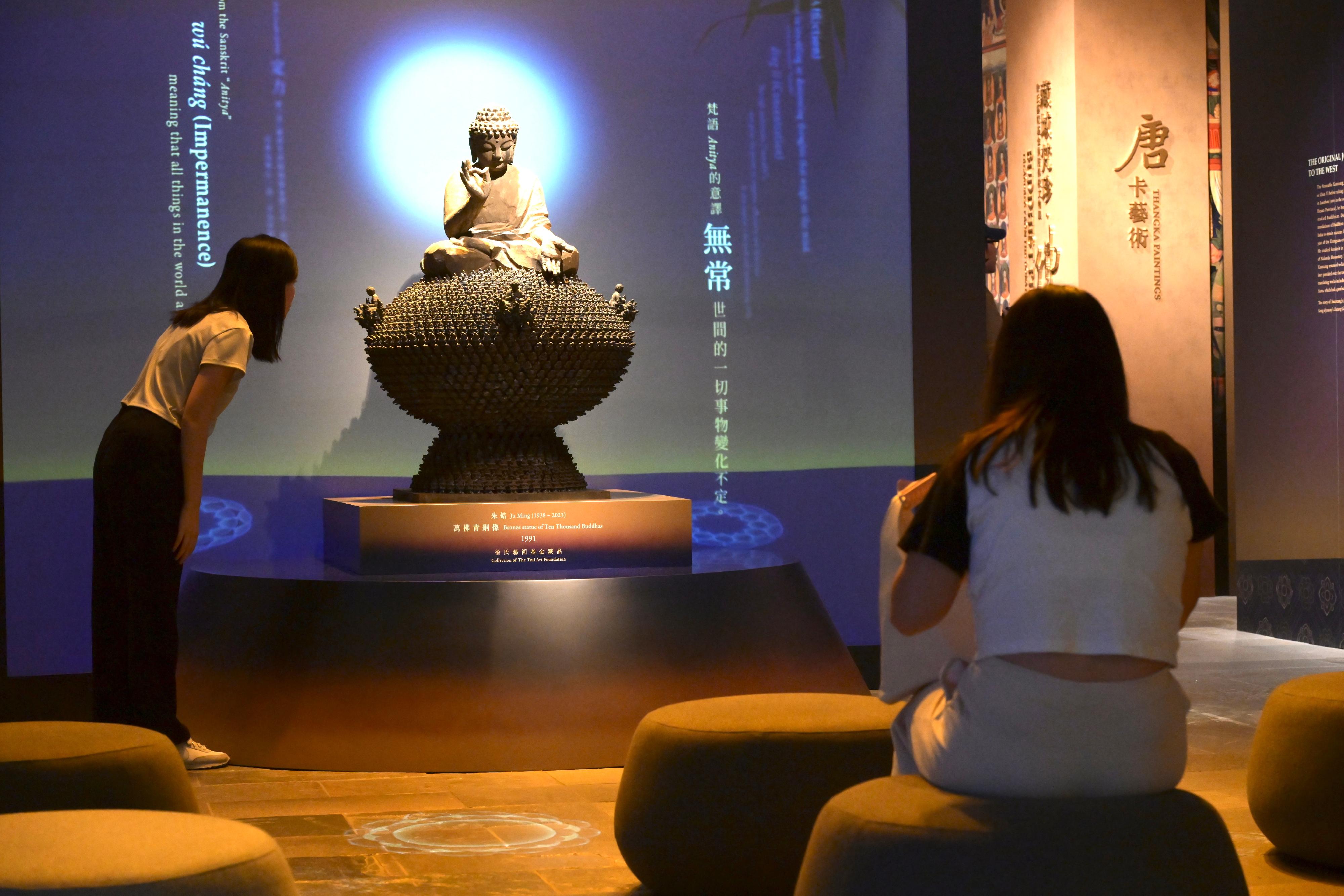 The opening ceremony of the exhibition "Buddhist Pilgrimage: Treasures from the Donation of The Tsui Art Foundation" was held today (October 29) at the Hong Kong Heritage Museum. Photo shows 'Let's talk about "gāthā"', which interprets the Buddhist origins behind everyday expressions, at the multimedia educational display zone.
