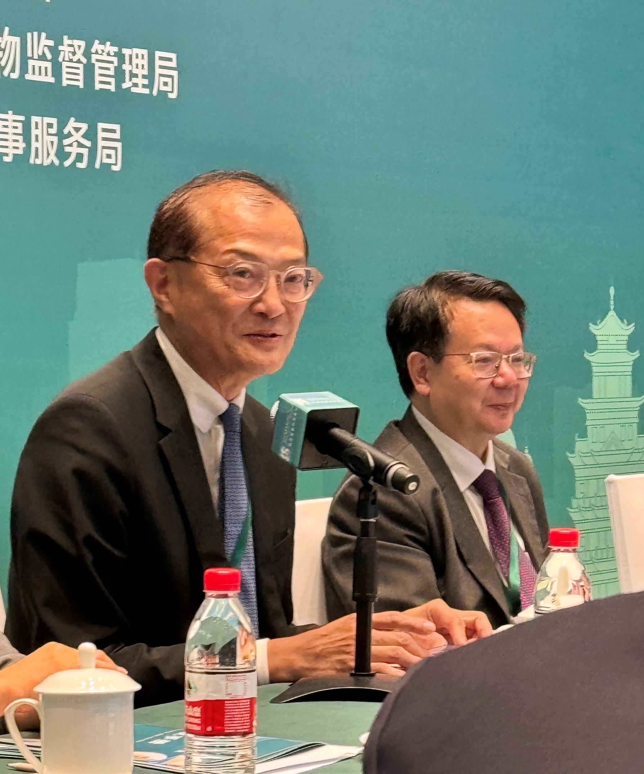 The Secretary for Health, Professor Lo Chung-mau (left), led a delegation to attend the 2024 Guangdong-Hong Kong-Macao Greater Bay Area Medical Products Administration Conference in Zhuhai today (October 30). Photo shows Professor Lo delivering a closing remarks at the Conference to introduce the latest developments of Hong Kong's healthcare policies, including complementing technological innovation with institutional innovation through expediting the reform of the approval mechanism for drugs and medical devices, strengthening biomedical technology research and development and translation, and promoting the internationalisation of Chinese medicines as put forward in "The Chief Executive's 2024 Policy Address".