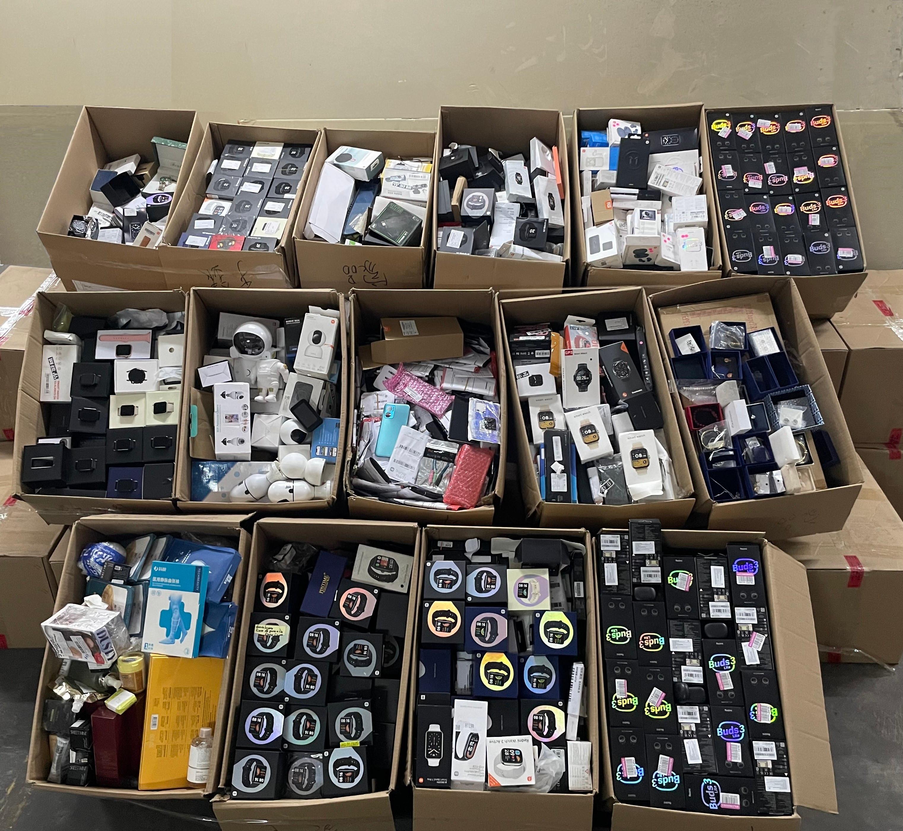 Hong Kong Customs on October 17 detected a suspected case of using an ocean-going vessel to smuggle goods to Pakistan at the Kwai Chung Container Terminals. A batch of suspected smuggled goods, including electronic goods, watches, cosmetic products and accessories, with an estimated market value of over $3 million was seized. Photo shows some of the suspected smuggled goods seized.
