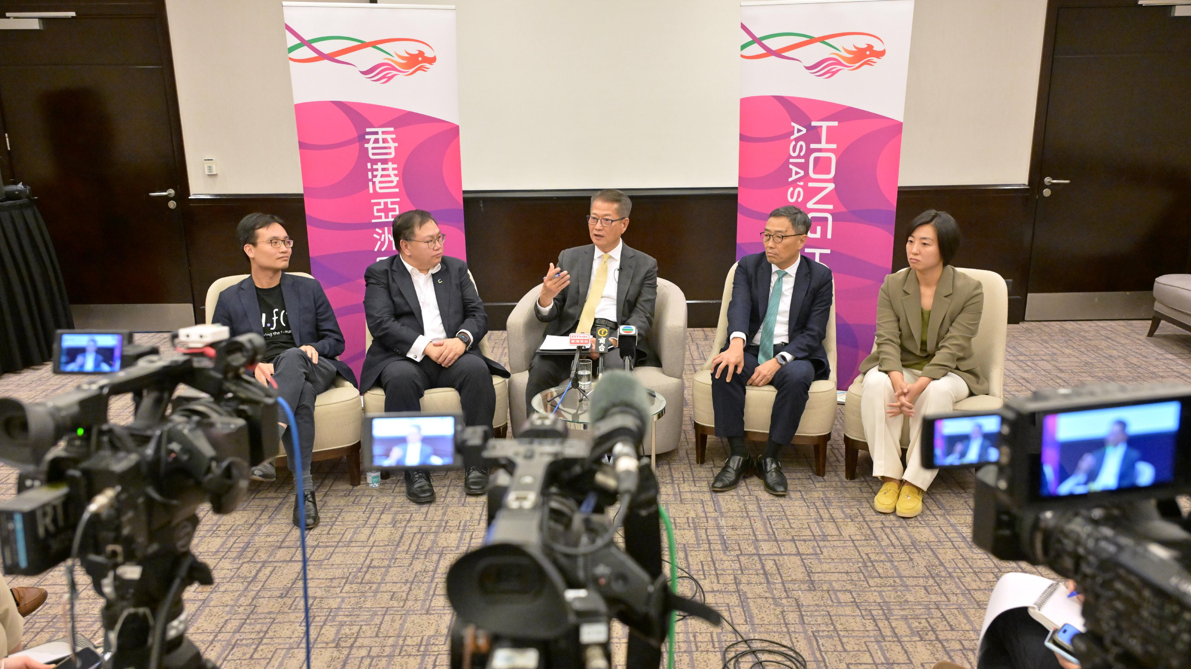 The Financial Secretary, Mr Paul Chan, continued to lead a delegation visiting Riyadh, Saudi Arabia, yesterday (October 31, Riyadh time).  Photo shows Mr Chan (centre), together with the Chief Executive Officer of Hong Kong Science and Technology Parks Corporation, Mr Albert Wong (second right), and Board of Directors of Cyberport, Dr Charleston Sun (second left), and representatives from the two parks meeting with the media.