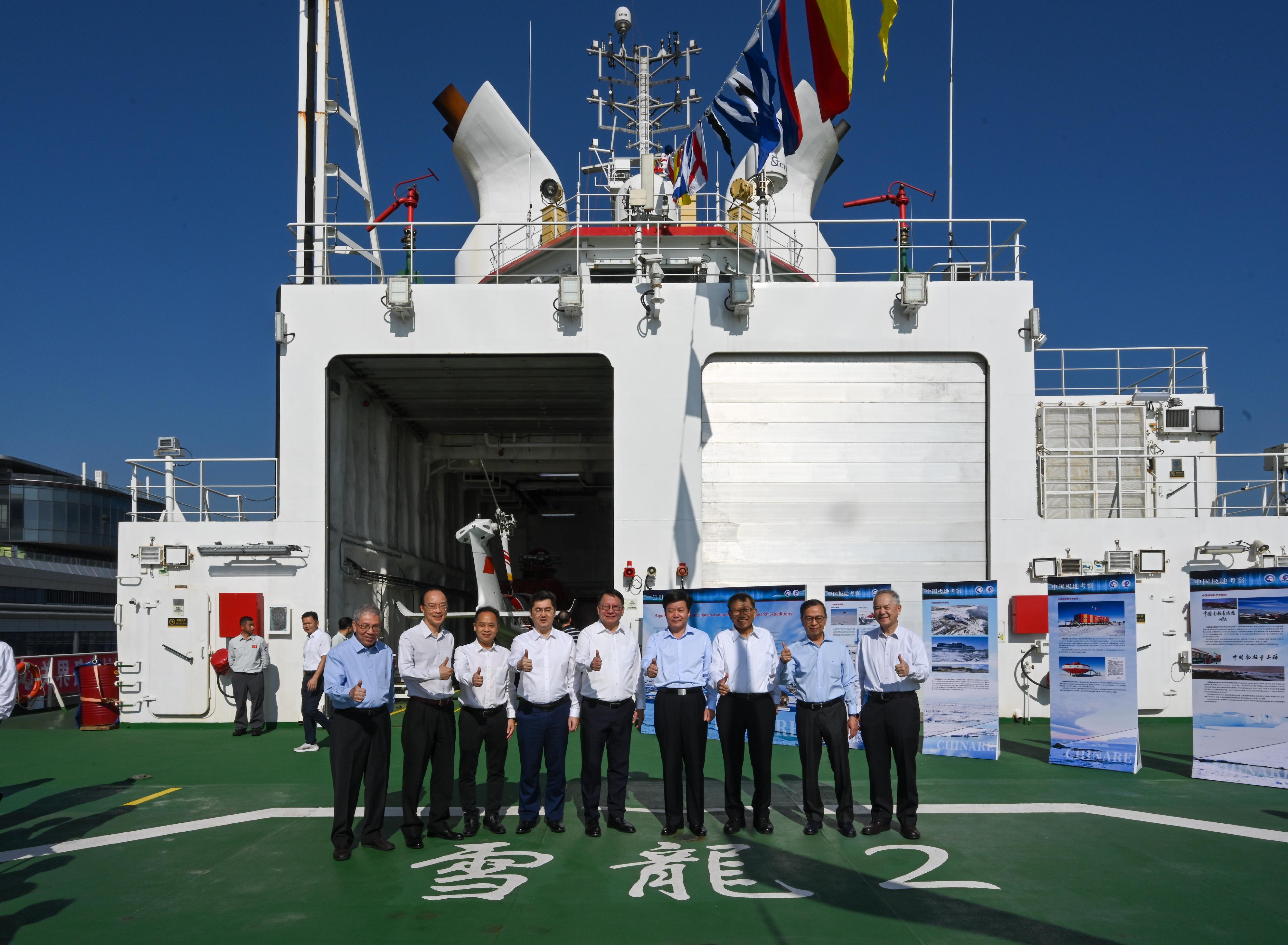 The Chief Secretary for Administration, Mr Chan Kwok-ki, attended the send-off event of China's 41st Antarctic expedition team in Guangzhou today (November 1). Photo shows (from third left) Deputy Director-General of the Department of Educational, Scientific and Technological Affairs of the Liaison Office of the Central People's Government in the Hong Kong Special Administrative Region Mr Ye Shuiqiu; the Mayor of the Guangzhou Municipal Government, Mr Sun Zhiyang; Mr Chan; Vice Minister of the Ministry of Natural Resources Mr Sun Shuxian; the Vice-Chancellor and President of the Chinese University of Hong Kong, Professor Rocky Tuan, and other guests touring the vessel Xuelong 2.