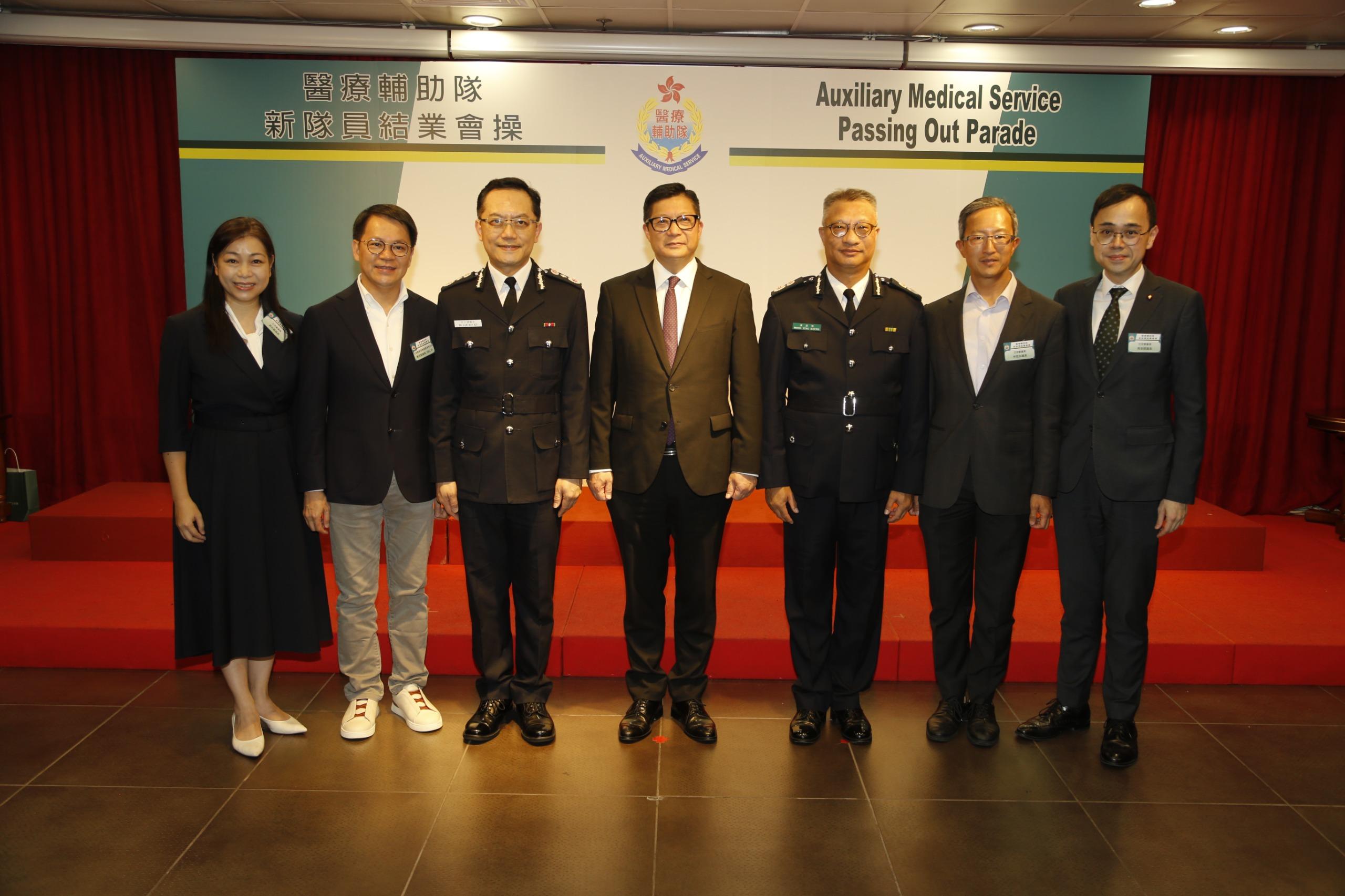 The Auxiliary Medical Service (AMS) held a passing-out parade today (November 3), where the 287 new members were reviewed by the Secretary for Security, Mr Tang Ping-keung. Photo shows Mr Tang (centre); the Commissioner of the AMS, Dr Ronald Lam (third left); the Chief Staff Officer of the AMS, Mr Wong Ying-keung (third right); the Chairman of the Panel on Security, Mr Chan Hak-kan (second left); Legislative Council Members Dr David Lam (second right), Ms Lilian Kwok (first left) and Mr Edmund Wong (first right).