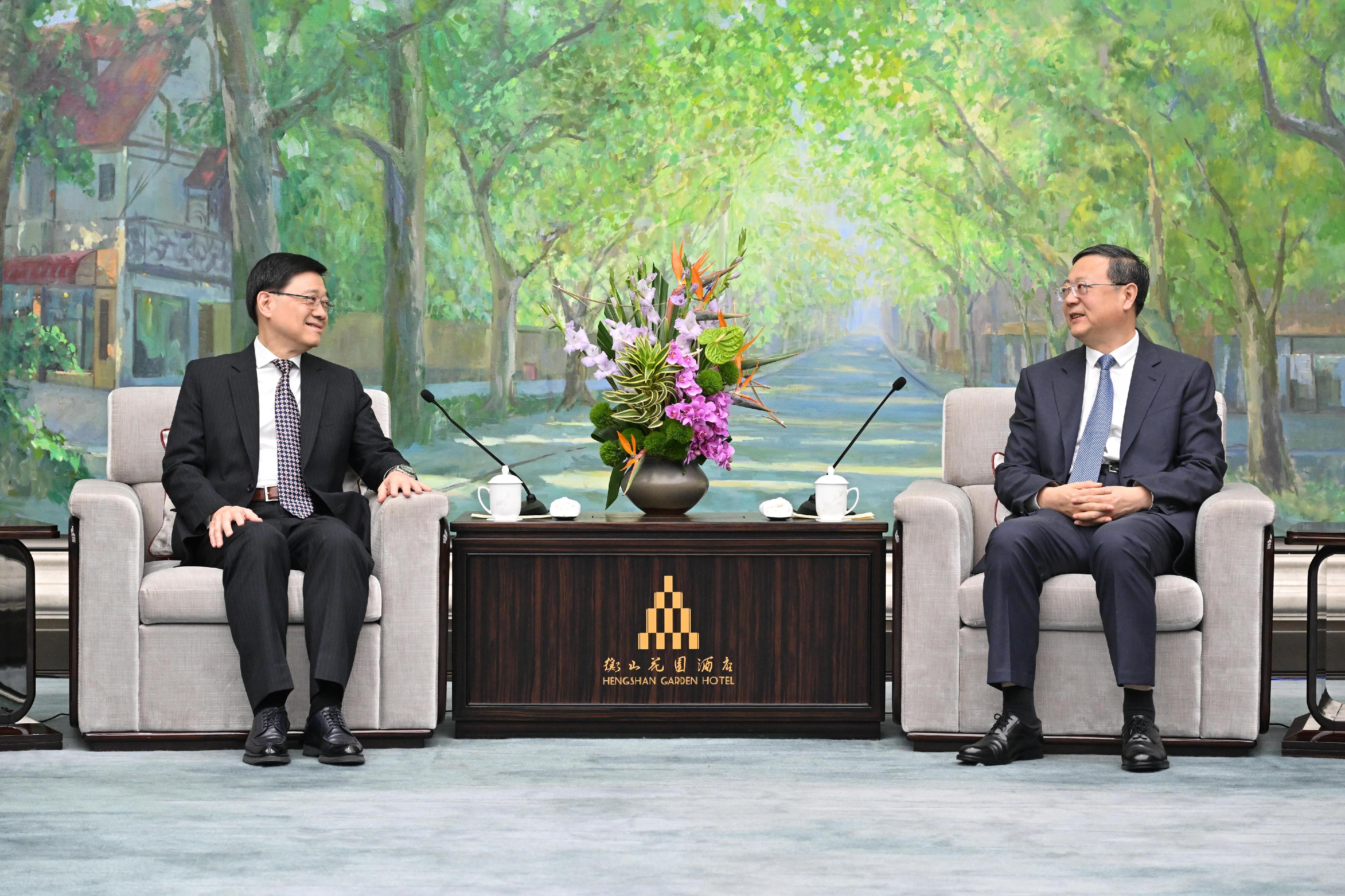 The Chief Executive, Mr John Lee (left), meets with the Secretary of the CPC Shanghai Municipal Committee, Mr Chen Jining (right), in Shanghai today (November 6).