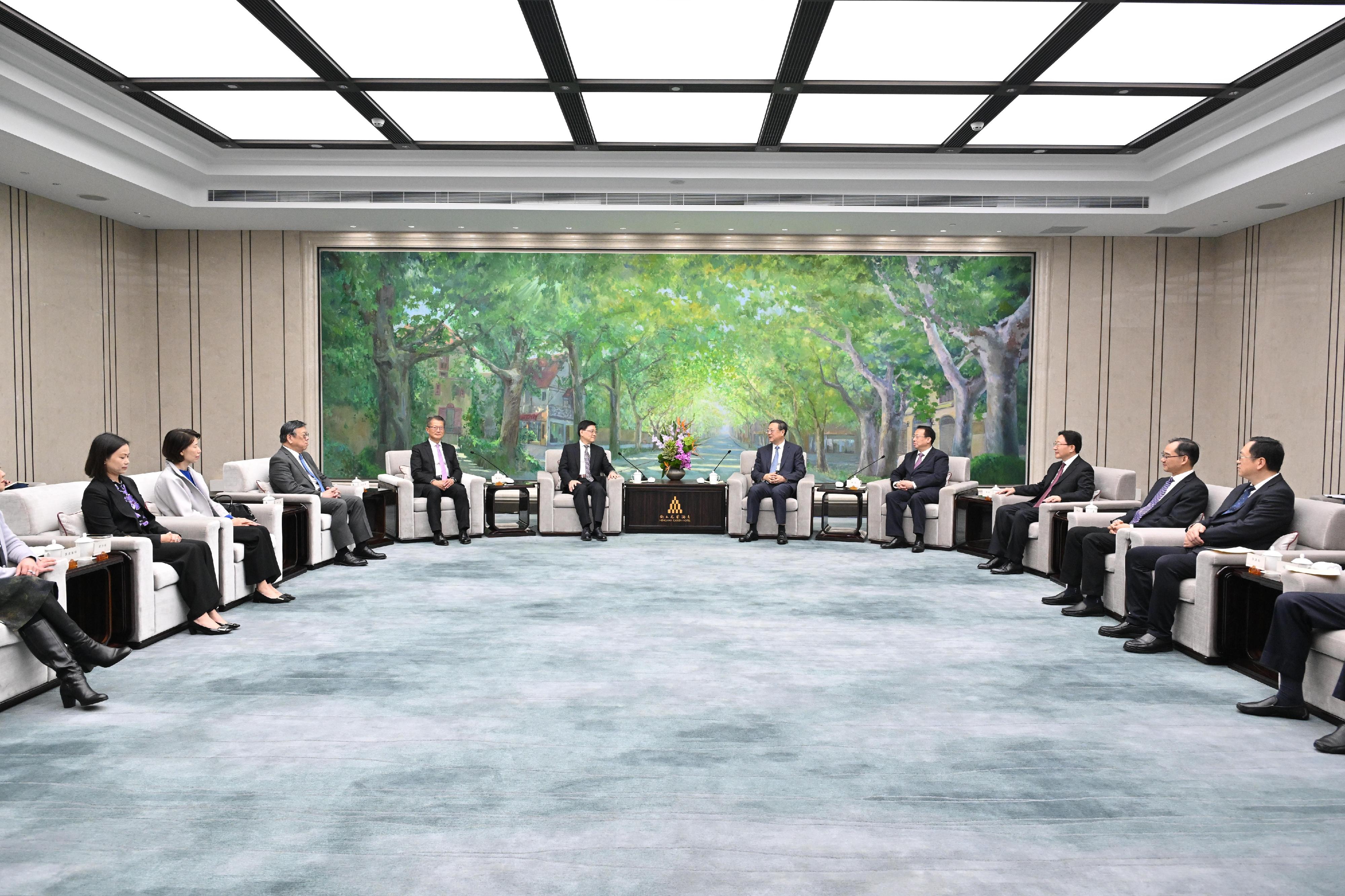 The Chief Executive, Mr John Lee (fifth left), meets with the Secretary of the CPC Shanghai Municipal Committee, Mr Chen Jining (fifth right), and the Mayor of Shanghai, Mr Gong Zheng (fourth right), in Shanghai today (November 6). The Financial Secretary, Mr Paul Chan (fourth left); the Secretary for Commerce and Economic Development, Mr Algernon Yau (third left); and the Director of the Chief Executive's Office, Ms Carol Yip (second left), also attend.