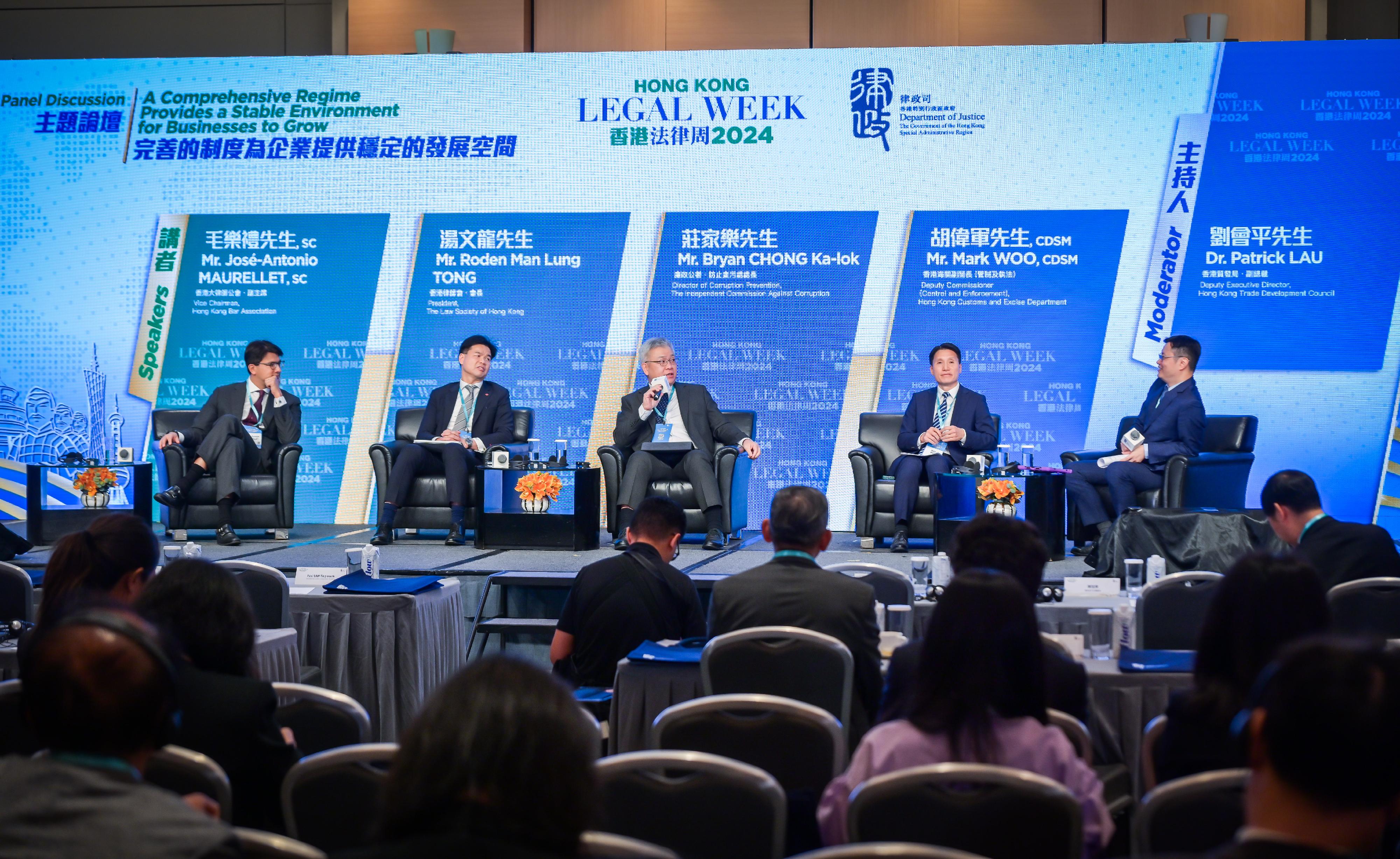 The Rule of Law: The Best Business Environment event was held today (November 8) as the finale of Hong Kong Legal Week 2024. Photo shows (from left) Vice-Chairman of the Hong Kong Bar Association Mr José-Antonio Maurellet, SC; the President of the Law Society of Hong Kong, Mr Roden Tong; the Director of Corruption Prevention of the Independent Commission Against Corruption, Mr Bryan Chong; the Deputy Commissioner (Control and Enforcement) of the Hong Kong Customs and Excise Department, Mr Mark Woo; and Deputy Executive Director of the Hong Kong Trade Development Council Dr Patrick Lau at the Panel Discussion: A Comprehensive Regime Provides a Stable Environment for Businesses to Grow.

