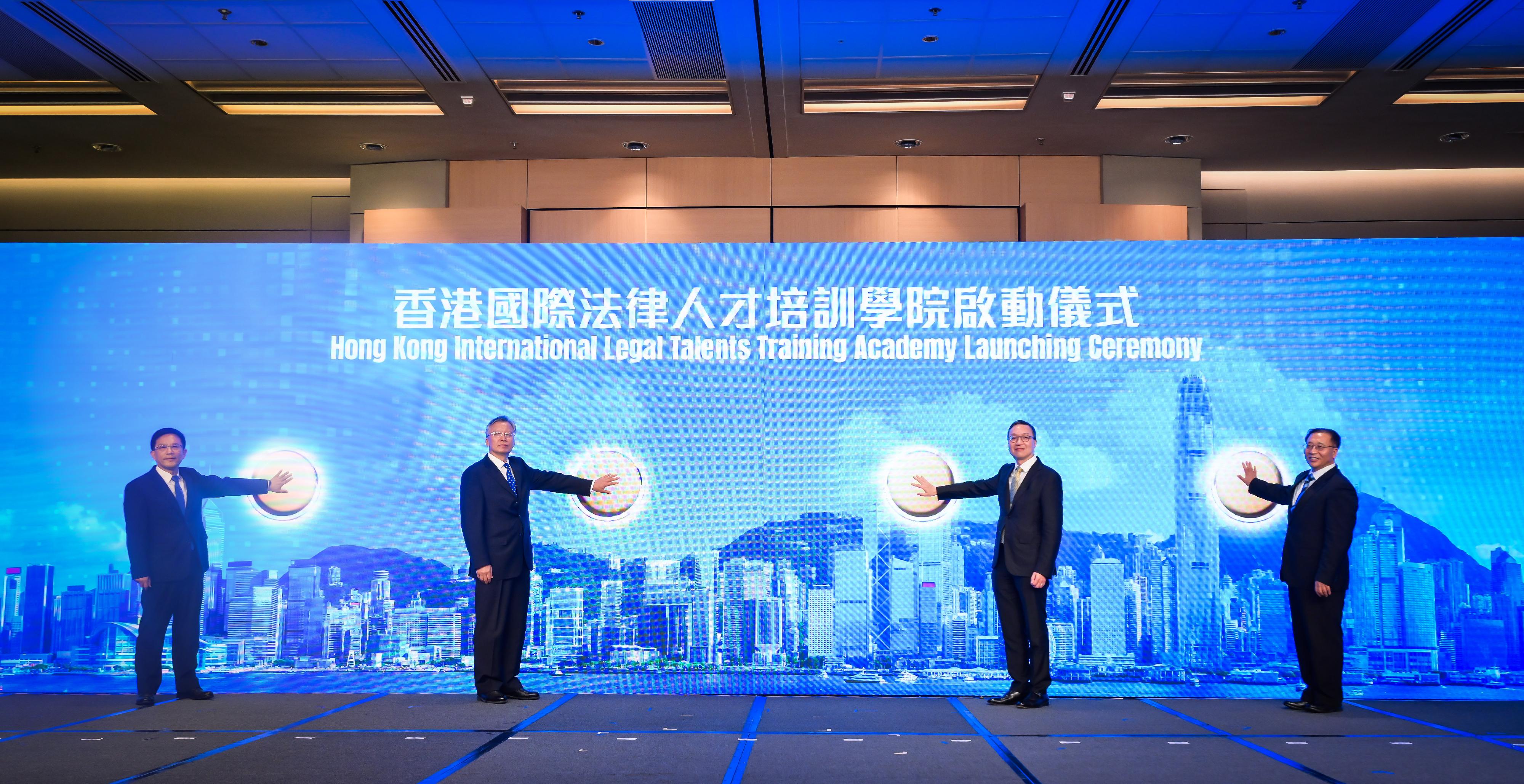 The Rule of Law: The Best Business Environment event was held today (November 8) as the finale of Hong Kong Legal Week 2024. Photo shows (from left) the Secretary General of the Liaison Office of the Central People's Government in the Hong Kong Special Administrative Region (HKSAR), Mr Wang Songmiao; Vice-Minister of Justice Mr Wang Zhenjiang; the Secretary for Justice, Mr Paul Lam, SC; and the Commissioner of the Ministry of Foreign Affairs in the HKSAR, Mr Cui Jianchun, attending the Hong Kong International Legal Talents Training Academy Launching Ceremony.
