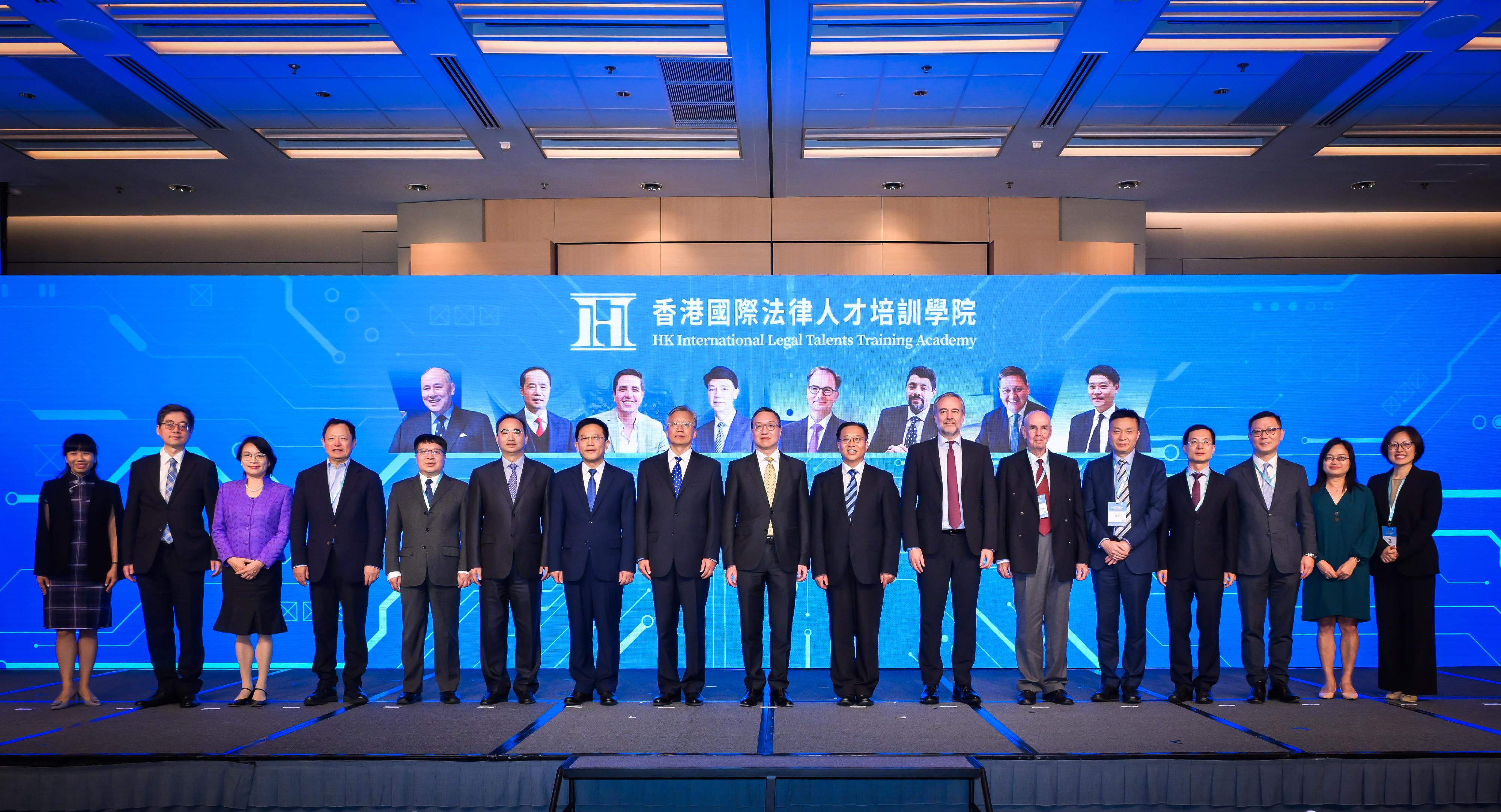 The Rule of Law: The Best Business Environment event was held today (November 8) as the finale of Hong Kong Legal Week 2024. Photo shows the Secretary General of the Liaison Office of the Central People's Government in the Hong Kong Special Administrative Region (HKSAR), Mr Wang Songmiao (seventh left); Vice-Minister of Justice Mr Wang Zhenjiang (eighth left); the Secretary for Justice, Mr Paul Lam, SC (ninth left); and the Commissioner of the Ministry of Foreign Affairs in the HKSAR, Mr Cui Jianchun (10th left), with members of the Hong Kong International Legal Talents Training Expert Committee and representatives of the Department of Justice attending the Hong Kong International Legal Talents Training Academy Launching Ceremony.

