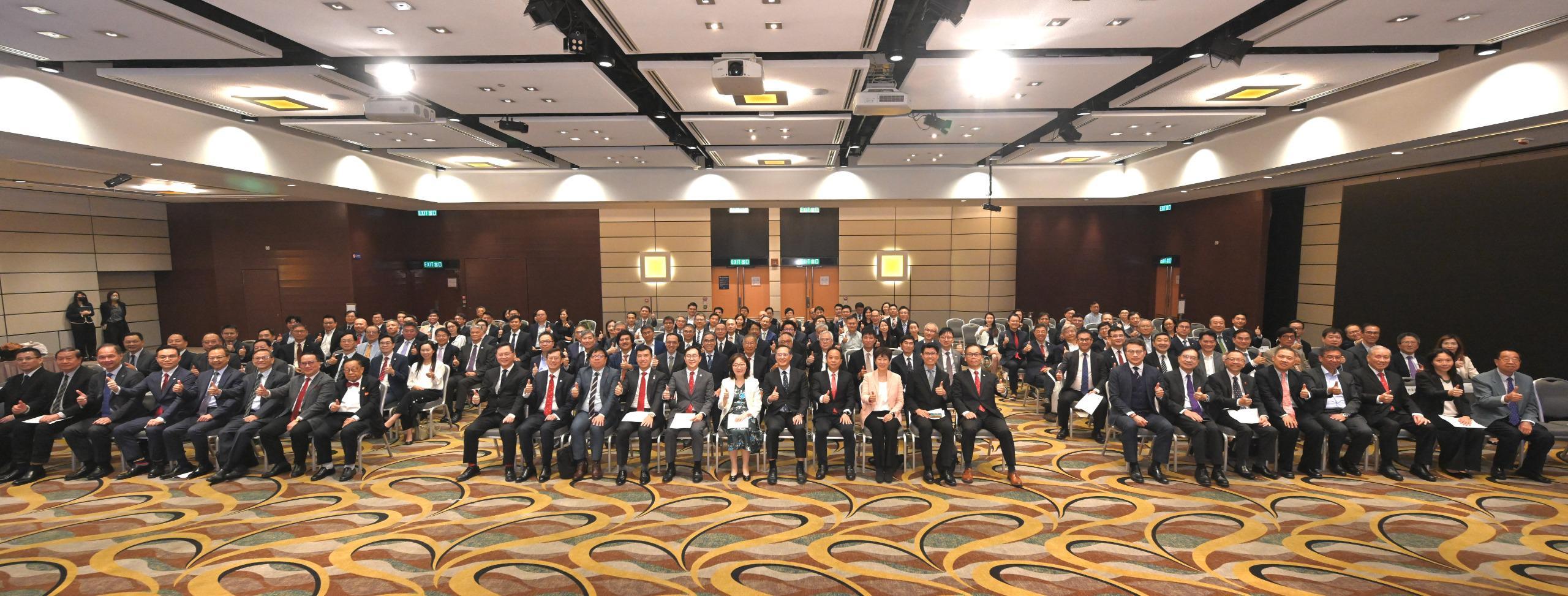 The Secretary for Development, Ms Bernadette Linn, today (November 12) attended a celebration ceremony organised by the Hong Kong Institution of Engineers (HKIE) for the first batch of Hong Kong engineers passing the Guangdong-Hong Kong-Macao Greater Bay Area engineering “Professional Title” evaluation. About 150 local engineers who obtained the corresponding engineering professional qualifications in the Mainland joined the ceremony. Photo shows (from first row, thirteenth left) the President of the HKIE, Mr Eric Ma; Ms Linn; the Permanent Secretary for Development (Works), Mr Ricky Lau; Deputy Director-General of the Department of Educational, Scientific and Technological Affairs of the Liaison Office of the Central People's Government in the Hong Kong Special Administrative Region Mr Ye Shuiqiu; other guests and attending local engineers.