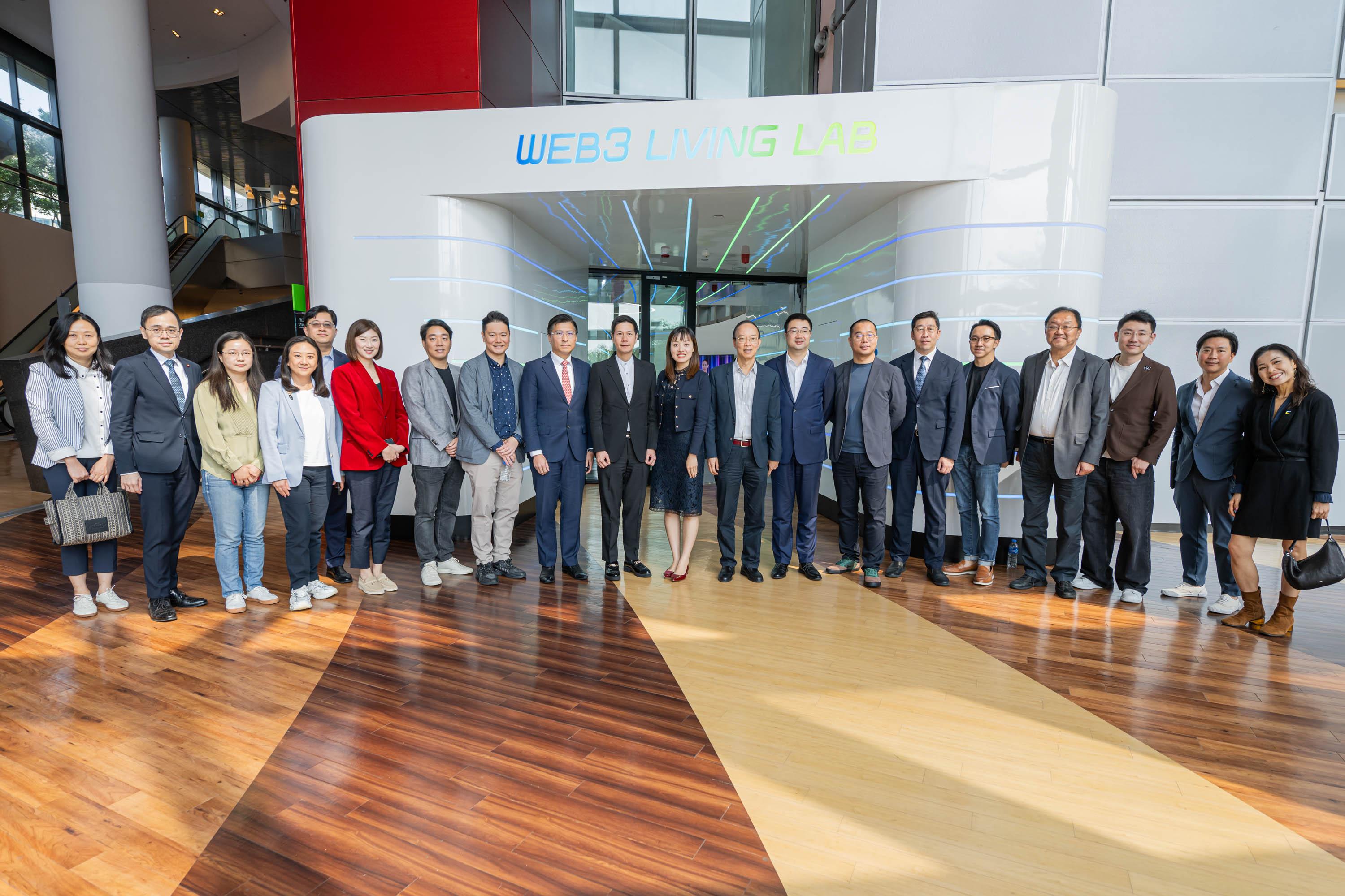 The Legislative Council (LegCo) Subcommittee on Issues Relating to the Development of Web3 and Virtual Assets visited Cyberport today (November 12). Photo shows LegCo Members, government officials, representatives of Cyberport and enterprises at the "Web3 Living Lab".