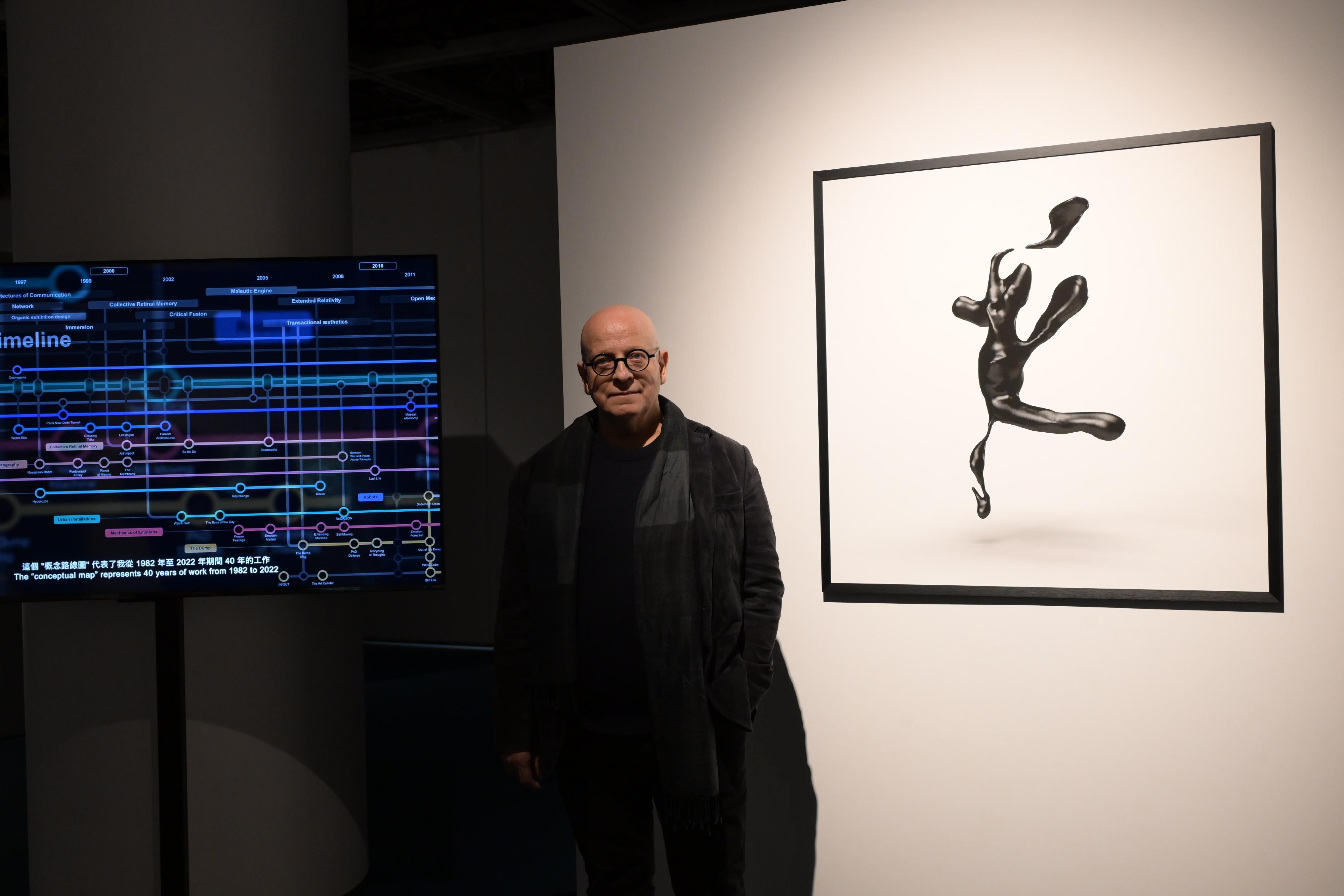 "Post Capitalistic Auction", a participatory theatre production under the Asia+ Festival, will be staged at Hong Kong City Hall Theatre on November 16 and 17. Photo shows one of the artists, Maurice Benayoun from France and his lot, at the auction preview held today (November 13).