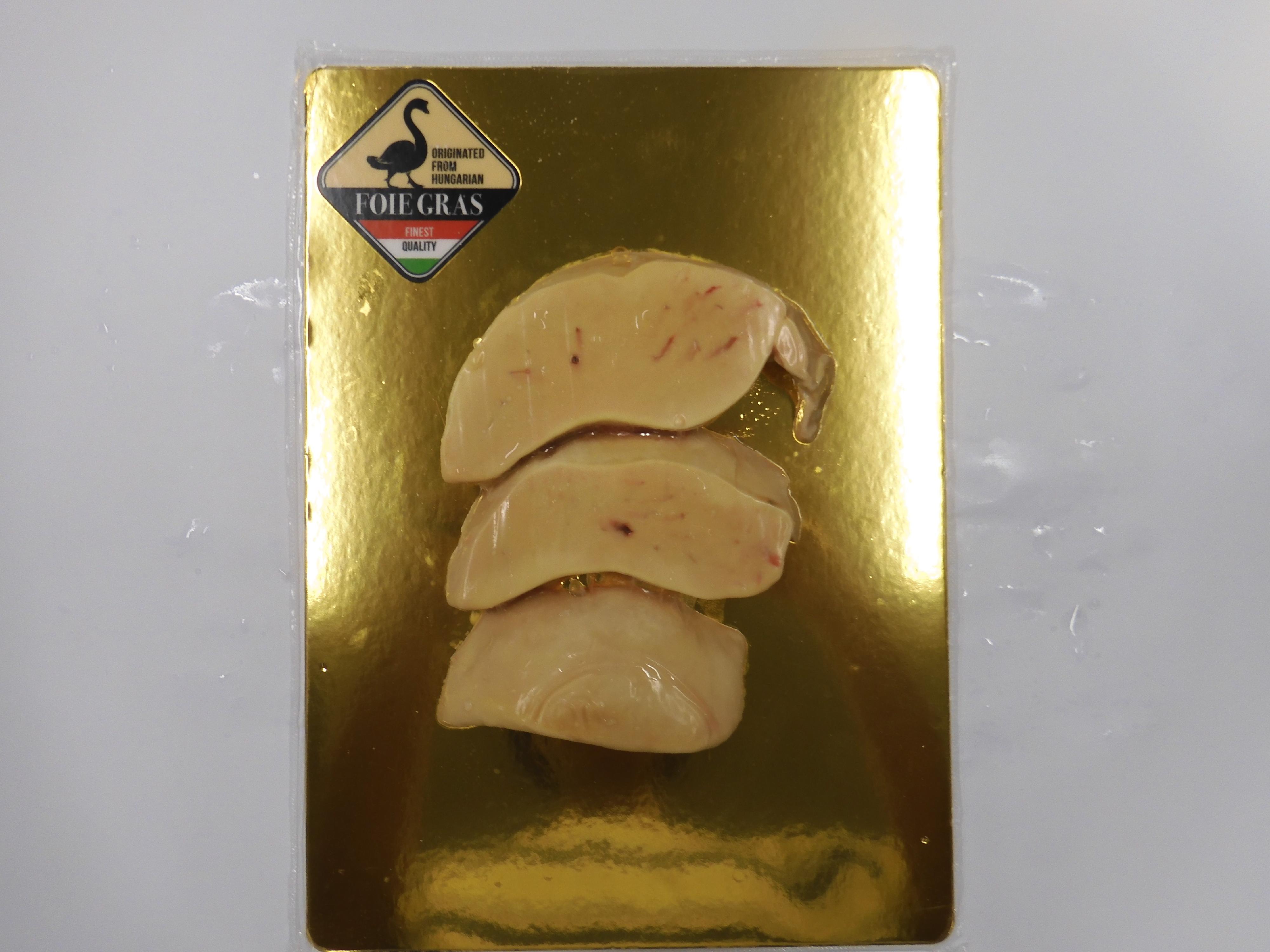 A food wholesaler was convicted of supplying a kind of Chinese duck liver that was falsely claimed to be "Hungarian goose liver", in contravention of the Trade Descriptions Ordinance, and was fined $45,000 at the Shatin Magistrates' Courts today (November 13). Photo shows the food product involved in the case. 
