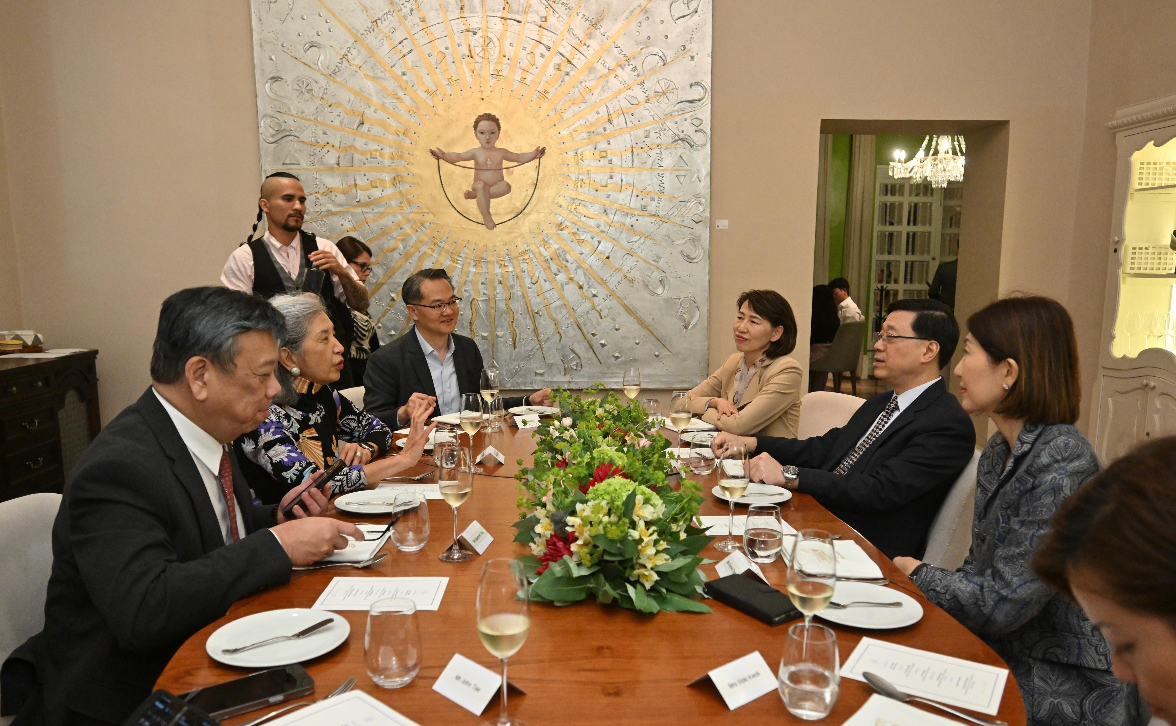The Chief Executive, Mr John Lee (second right), attends a dinner on November 14 (Lima time) with Hong Kong, China's representative to the Asia-Pacific Economic Cooperation Business Advisory Council to exchange views on various issues, including promoting Hong Kong's advantages and development opportunities and enhancing the city's collaboration with other economies.