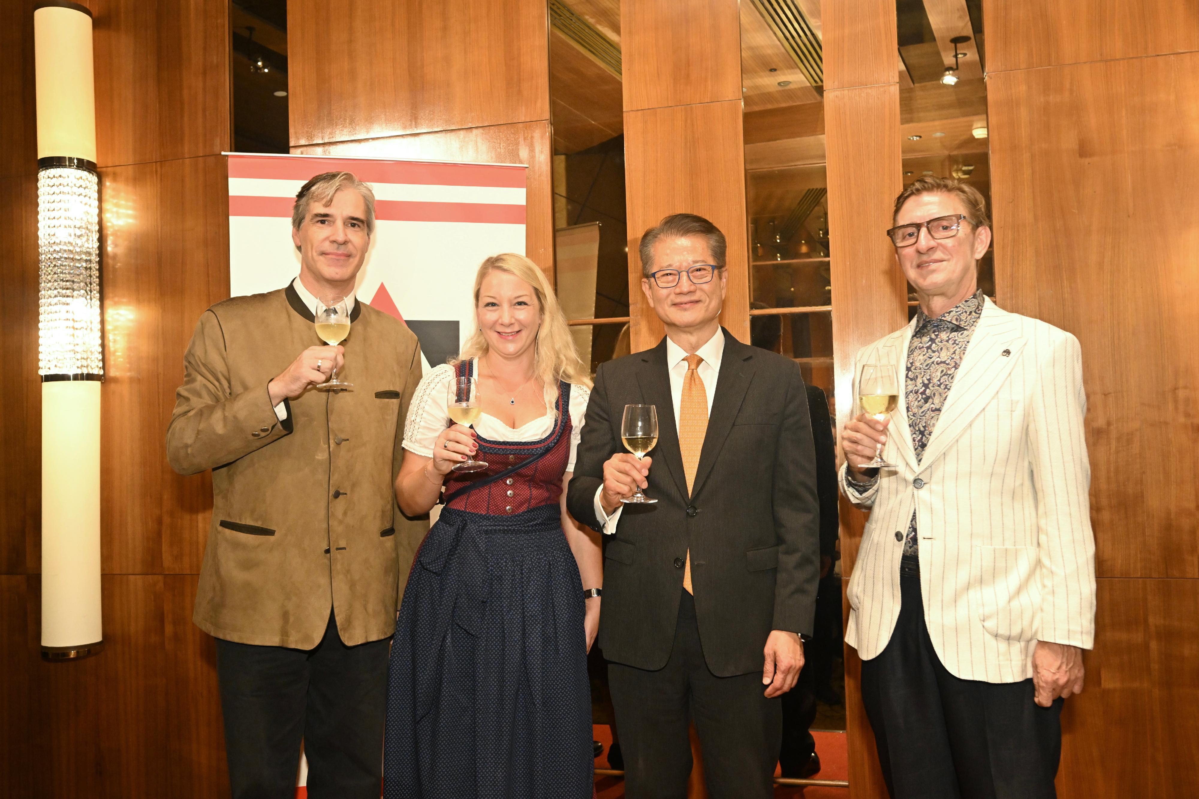 The Financial Secretary, Mr Paul Chan (second right), attended the AustroCham Heurigen 2024 today (November 15). Photo shows Mr Chan in a group photo with Consul General of Austria to Hong Kong and Macao, Mr Gerhard Zettl (first right), Chairman of AustroCham, Mr Wilhelm Brauner (first left) and others, at the event. 