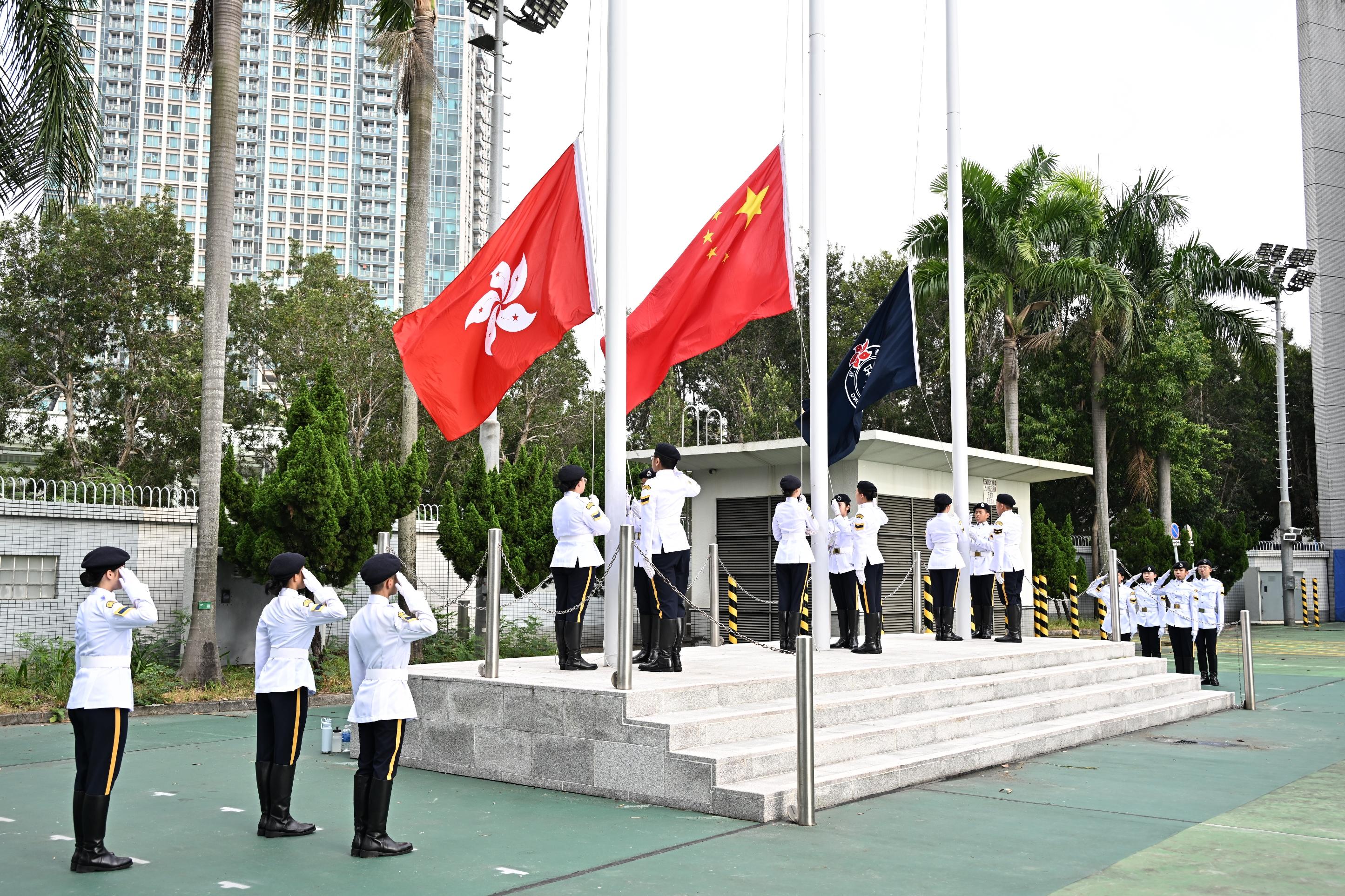 The Civil Aid Service Cadet Corps held the 144th New Cadets Passing-out Parade today (November 16). Photo shows the Cadet Corps Guard of Honour performing a flag-raising ceremony.