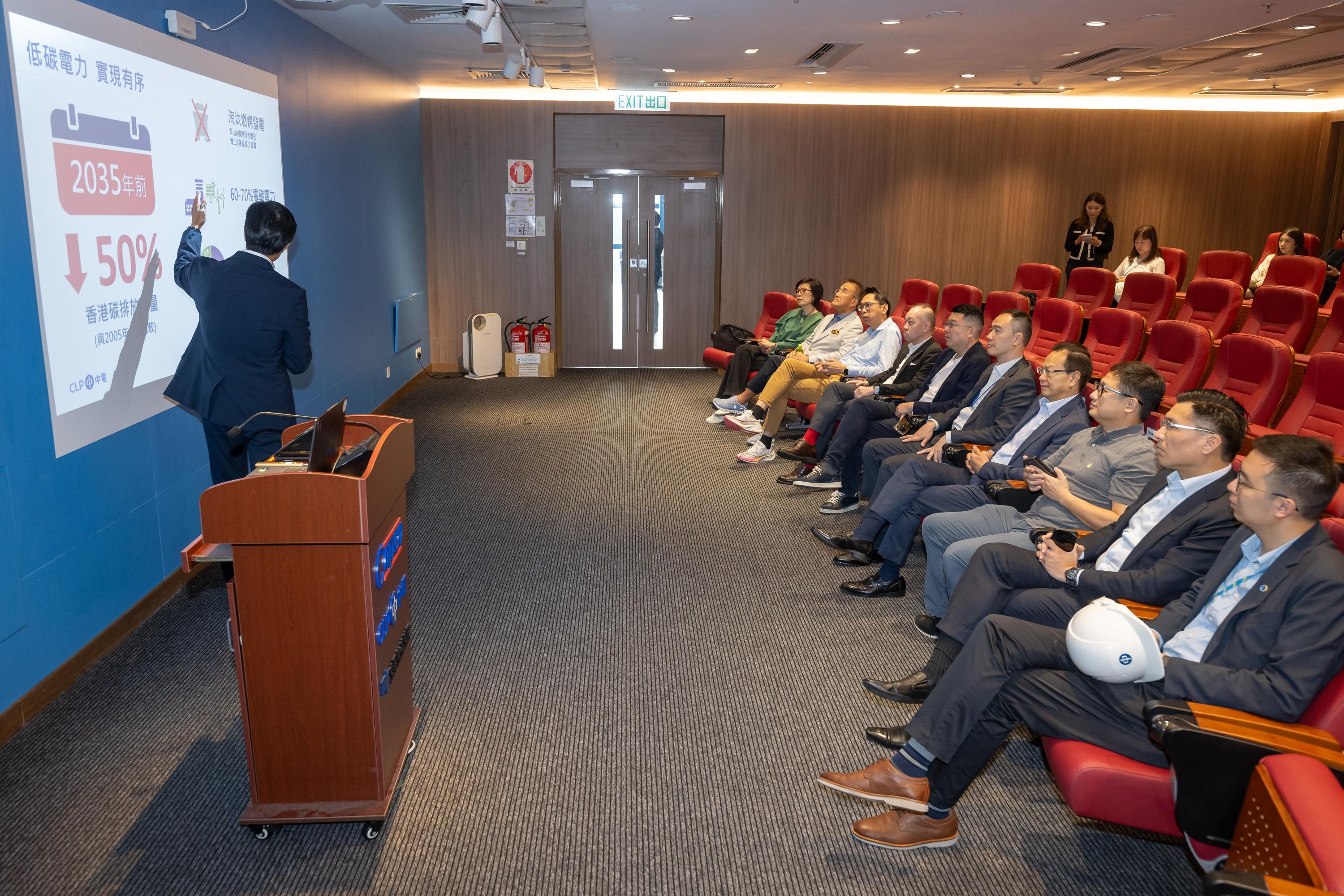 The Legislative Council (LegCo) Panel on Environmental Affairs visits Black Point Power Station of CLP Power Hong Kong Limited (CLP) at Tuen Mun today (November 18). Photo shows Members receiving a briefing by a CLP representative on its decarbonisation roadmap.