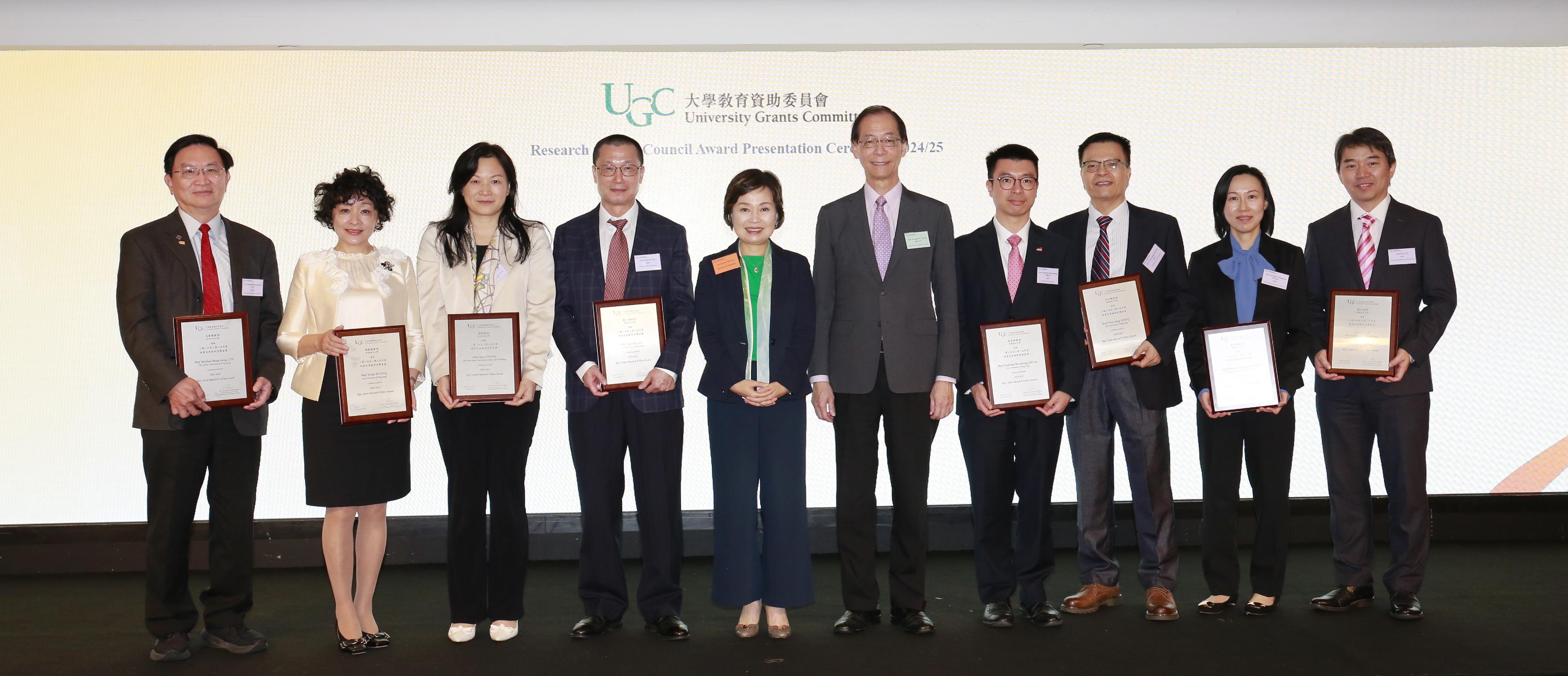 The Research Grants Council (RGC) today (November 19) held an award presentation ceremony to honour 103 academics from the eight University Grants Committee-funded universities for their distinguished research achievements and significant contribution to the higher education sector. Photo shows the Secretary for Education, Dr Choi Yuk-lin (fifth left), and the RGC Chairman, Professor Timothy W. Tong (fifth right), with RGC Senior Research Fellows Professor Michael Lyu (first left), Professor Huang Yihui (second left), Professor Zhang Qian (third left), Professor Jia Xiaohua (fourth left), Professor Anderson Shum (fourth right), Professor Wang Wenxiong (third right), Professor Christina Wong (second right), and Professor Yan Zi (first right).