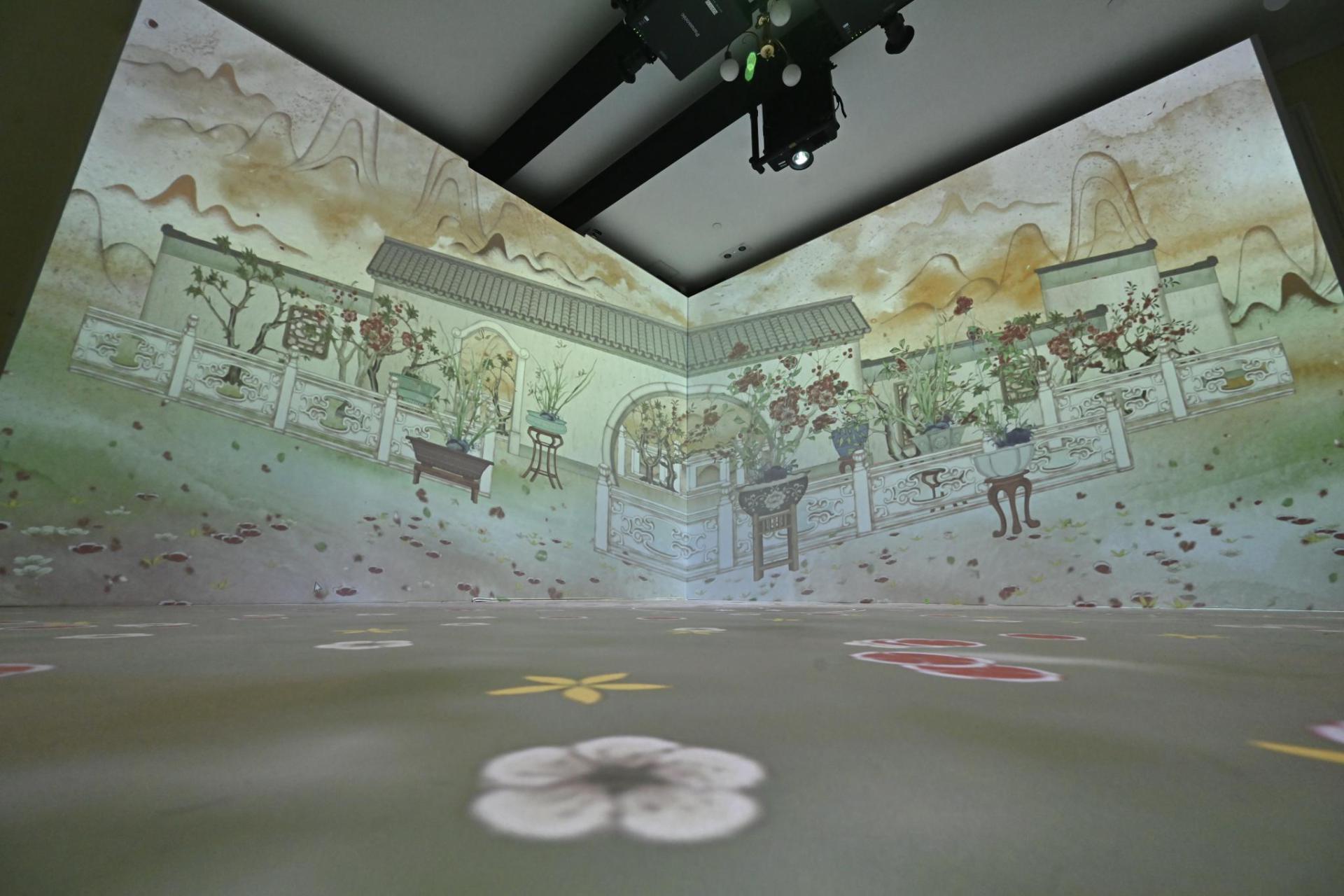 To celebrate the 40th anniversary of the Flagstaff House Museum of Tea Ware, the Hong Kong Artist Dialogue Series: "Garden of Four Seasons" interactive display will be opened from November 24. Photo shows the interactive display created by art group DBIS. By integrating art and technology, the audience can engage with the Twelve cups representing flowers of each month in wucai enamel from the museum's collection and experience the captivating appeal of the 12-month cups with the changing beauty of flowers across four seasons.