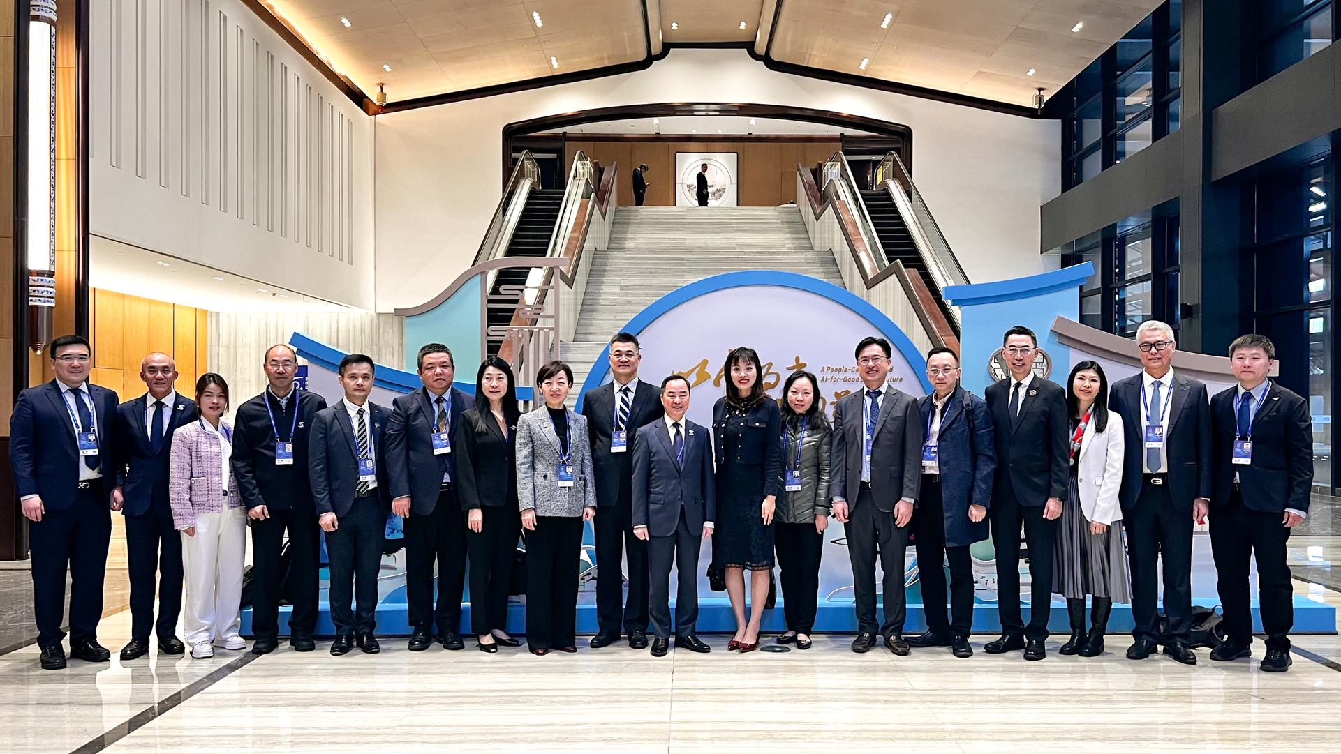 The Under Secretary for Innovation, Technology and Industry, Ms Lillian Cheong (eighth right), and the Commissioner for Digital Policy, Mr Tony Wong (ninth right), attended the opening ceremony and plenary session of the 2024 World Internet Conference Wuzhen Summit in Wuzhen, Hangzhou, yesterday (November 20) and are pictured with members of the Hong Kong delegation.