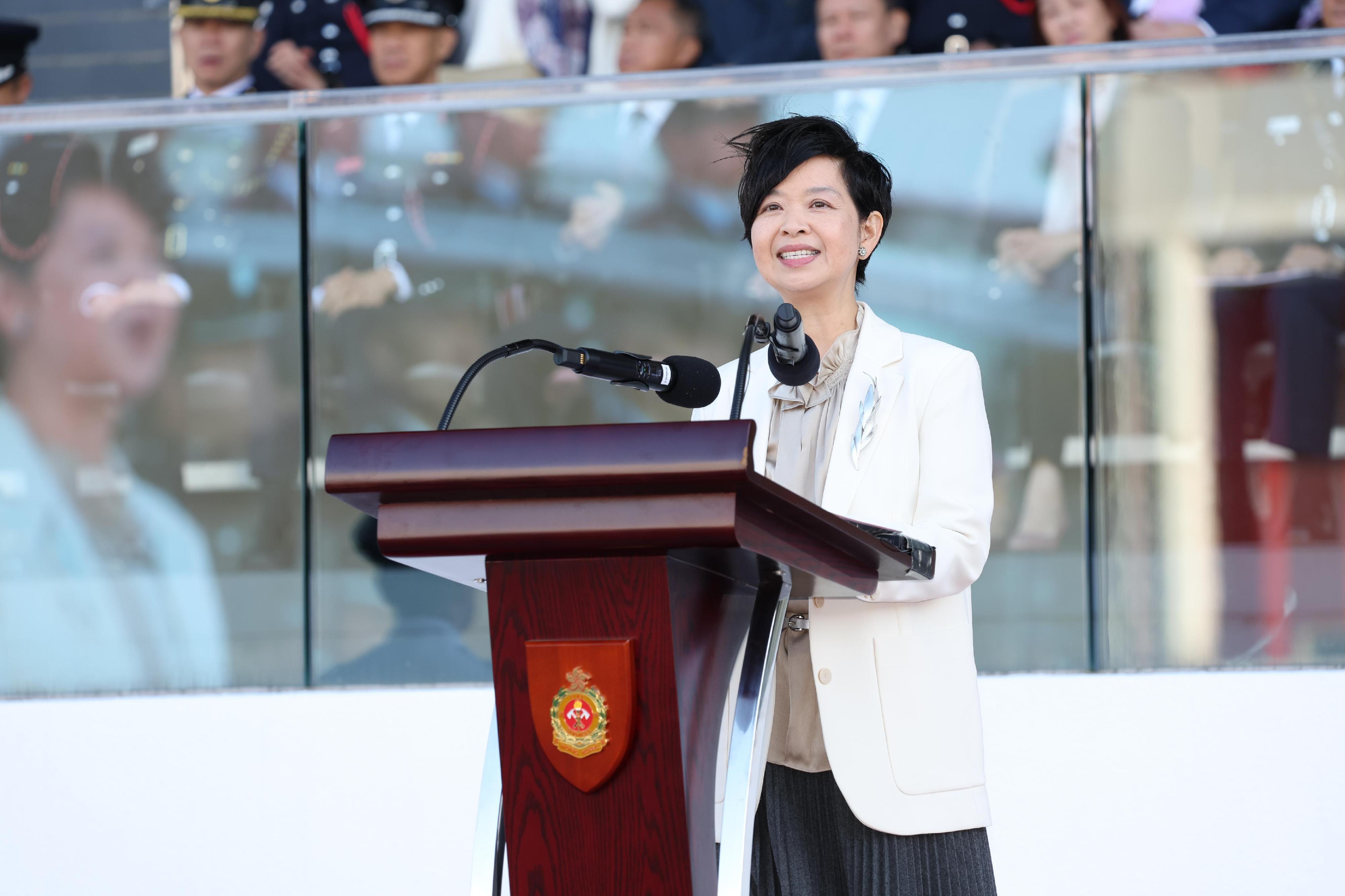 The Secretary for Housing, Ms Winnie Ho, reviewed the Fire Services passing-out parade at the Fire and Ambulance Services Academy today (November 22). Photo shows Ms Ho delivering a speech at the ceremony.