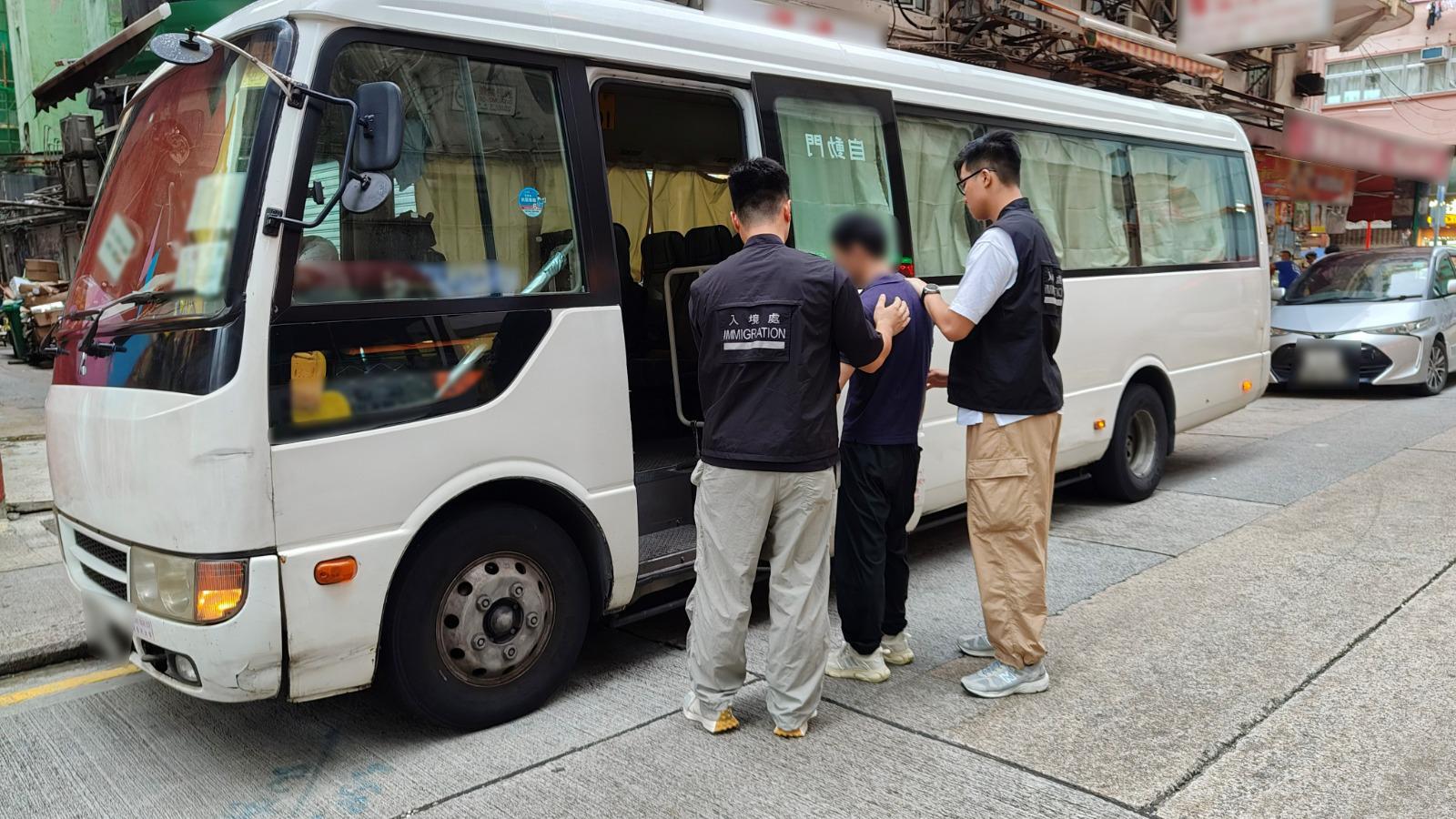 The Immigration Department mounted a series of territory-wide anti-illegal worker operations codenamed "Contribute" and "Twilight", and joint operations with the Hong Kong Police Force codenamed "Champion" and "Windsand", for four consecutive days from November 18 to yesterday (November 21). Photo shows a suspected illegal worker arrested during an operation.