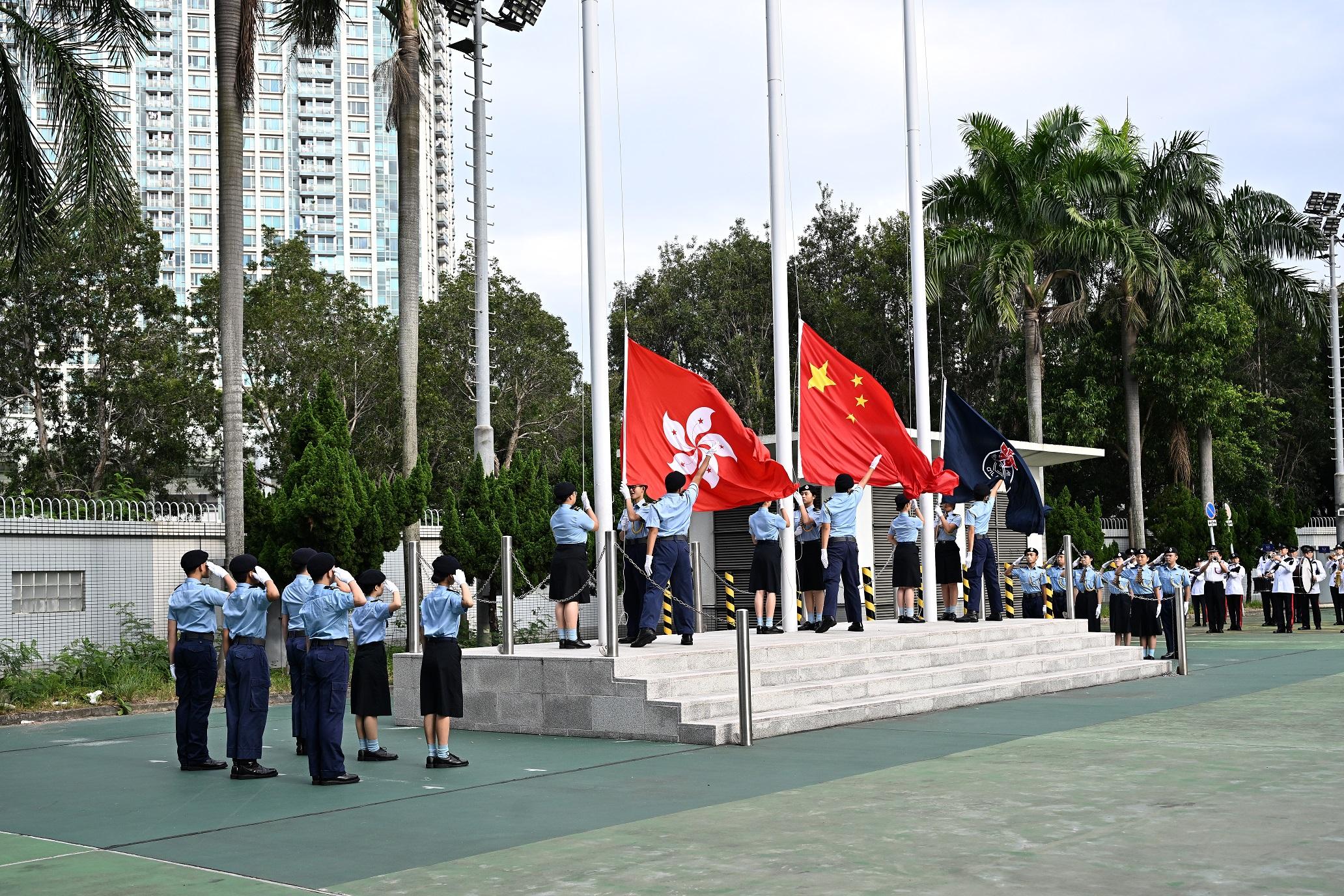 The Civil Aid Service held the Foot Drill Competition 2024 today (November 24). Photo shows the Guard of Honour performing a flag-raising ceremony.