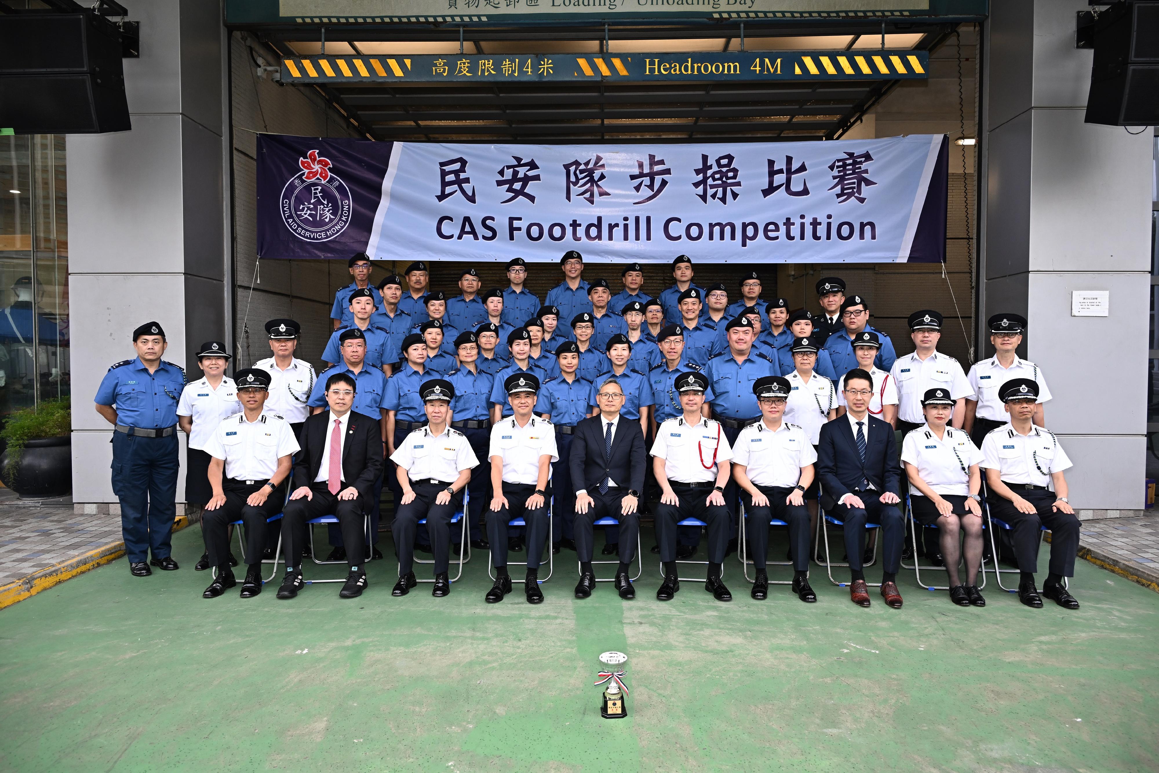 The Civil Aid Service held the Foot Drill Competition 2024 today (November 24). Photo shows the Under Secretary for Security, Mr Michael Cheuk (first row, fifth left), with representatives of the winning team.