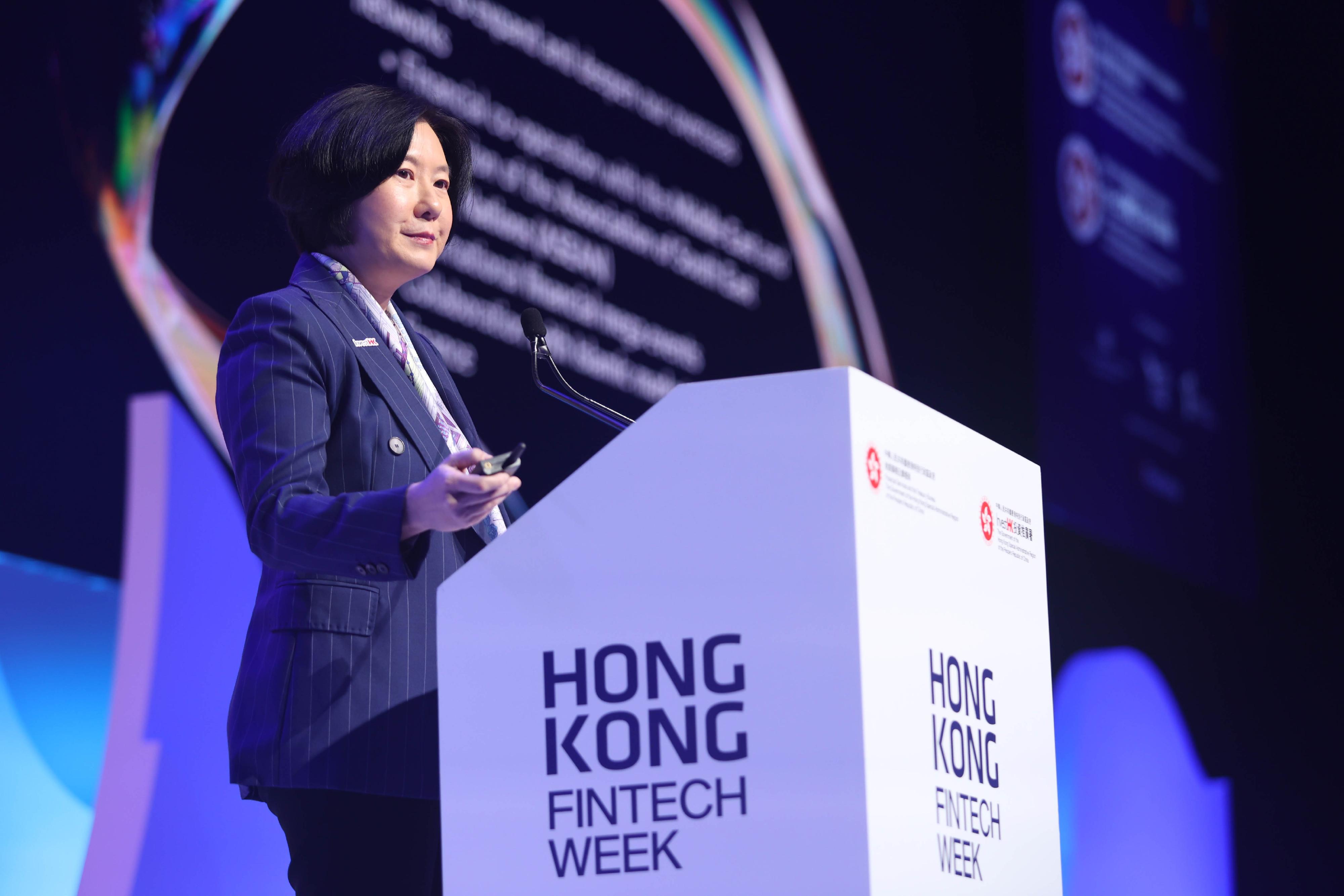 Photo shows the Director-General of Investment Promotion of InvestHK, Ms Alpha Lau, delivering a keynote address at the main conference on October 28 of Hong Kong FinTech Week 2024.