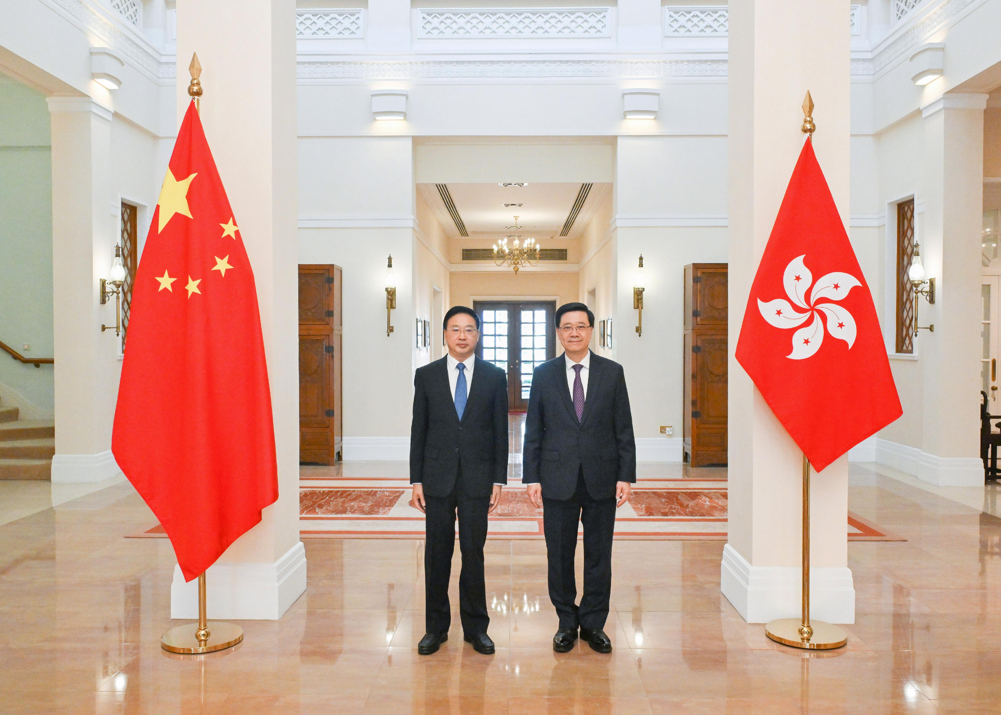 The Chief Executive, Mr John Lee (right), meets with the Deputy Secretary of the Party Leadership Group and First Deputy Prosecutor General of the Supreme People's Procuratorate, Mr Tong Jianming (left), at Government House today (November 27).