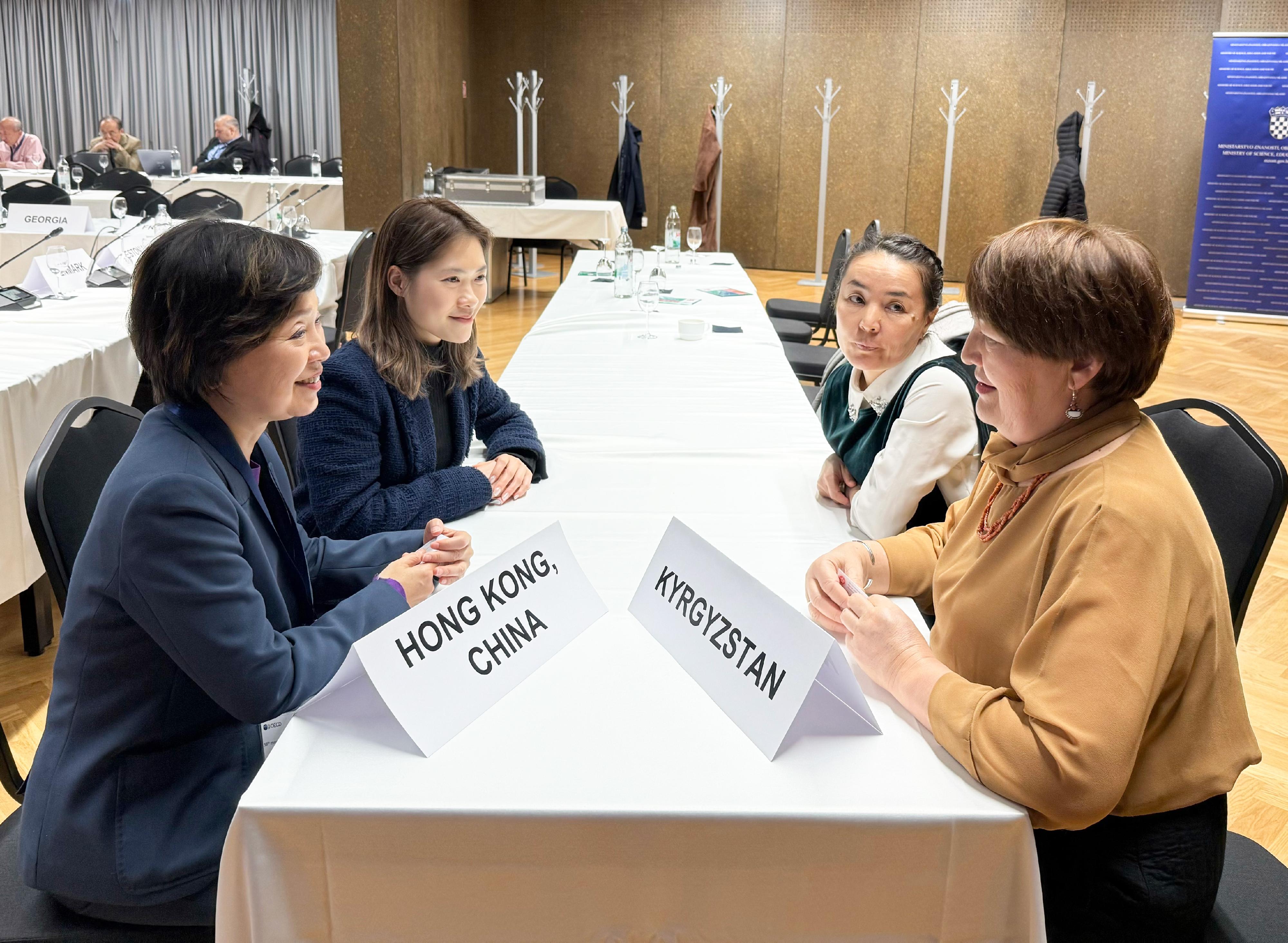 The Secretary for Education, Dr Choi Yuk-lin, attended the Programme for International Student Assessment Governing Board Meeting organised by the Organisation for Economic Co-operation and Development in Dubrovnik, Croatia, on November 27 (Dubrovnik time). Photo shows Dr Choi (first left) meeting the Minister of Education and Science of Kyrgyzstan, Ms Dogdurkul Kendirbaeva (first right).