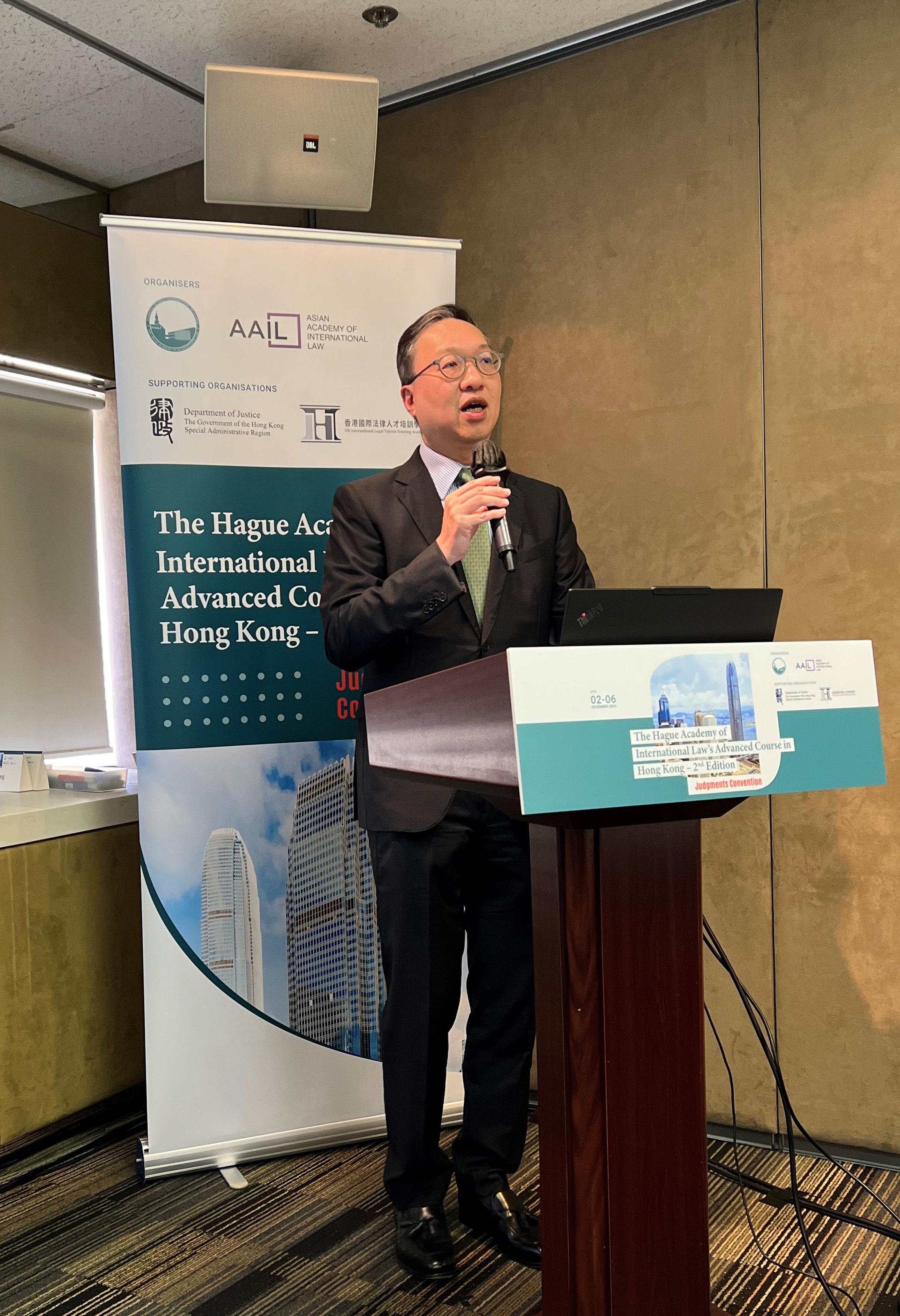 The Secretary for Justice, Mr Paul Lam, SC, delivers his opening remarks at The Hague Academy of International Law's Advanced Course in Hong Kong - 2nd Edition today (December 2).
