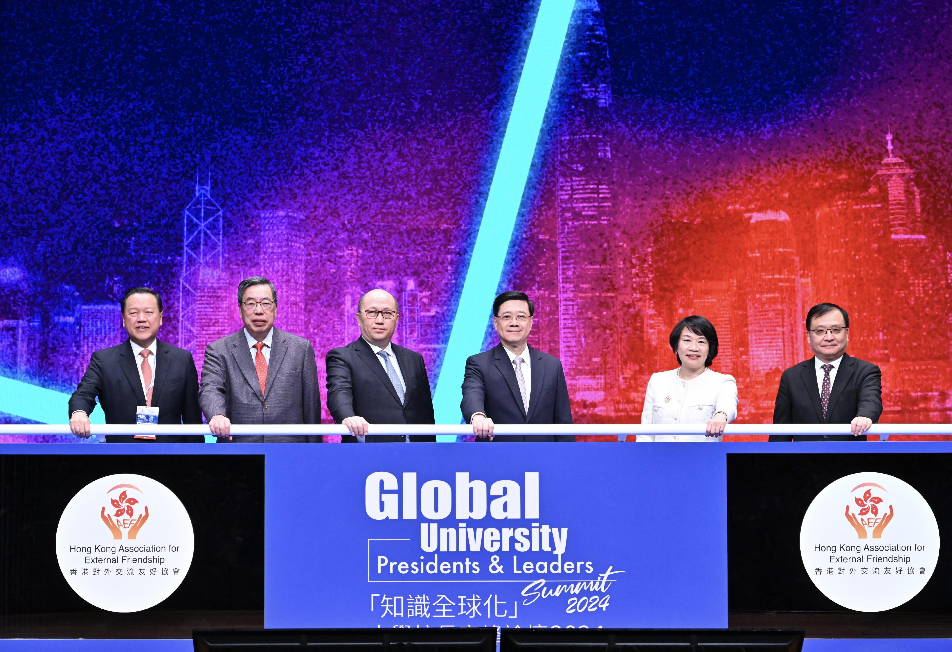 The Chief Executive, Mr John Lee, attended the Global University Presidents & Leaders Summit 2024 today (December 2). Photo shows (from left) the Chairman of the University Grants Committee, Mr Tim Lui; the President of the Legislative Council, Mr Andrew Leung; the Director of the Liaison Office of the Central People's Government in the Hong Kong Special Administrative Region, Mr Zheng Yanxiong; Mr Lee; the Founding President of the Hong Kong Association for External Friendship, Professor Priscilla Leung; and Deputy Commissioner of the Office of the Commissioner of the Ministry of Foreign Affairs of the People's Republic of China in the Hong Kong Special Administrative Region Mr Fang Jianming, officiating at the summit.