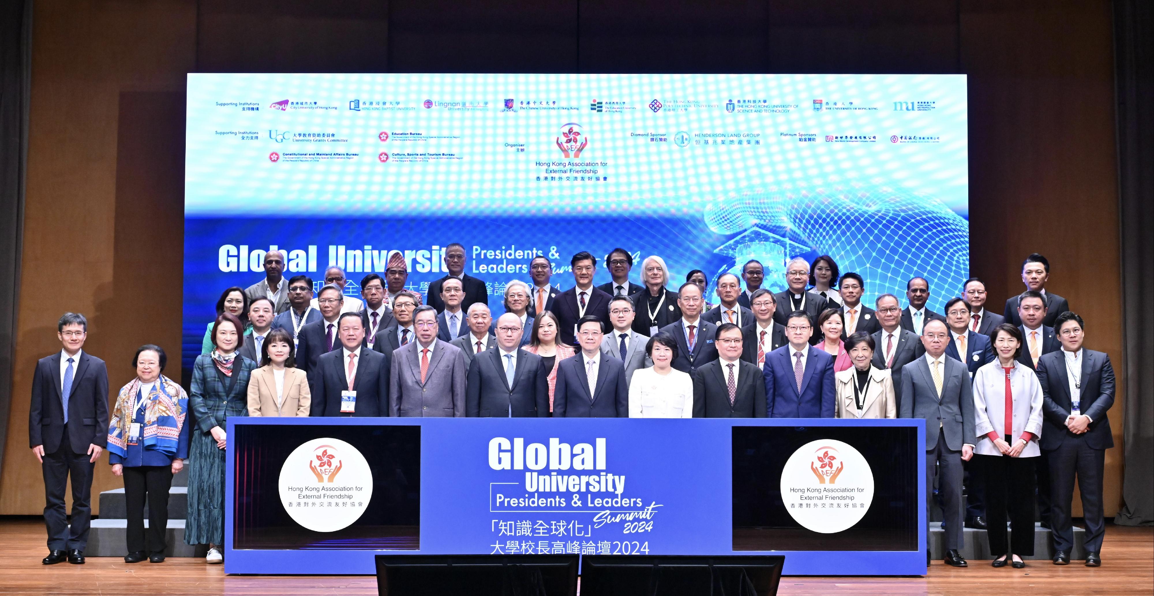 The Chief Executive, Mr John Lee, attended the Global University Presidents & Leaders Summit 2024 today (December 2). Photo shows (first row, from fifth left) the Chairman of the University Grants Committee, Mr Tim Lui; the President of the Legislative Council, Mr Andrew Leung; the Director of the Liaison Office of the Central People's Government in the Hong Kong Special Administrative Region, Mr Zheng Yanxiong; Mr Lee; the Founding President of the Hong Kong Association for External Friendship, Professor Priscilla Leung; Deputy Commissioner of the Office of the Commissioner of the Ministry of Foreign Affairs of the People's Republic of China in the Hong Kong Special Administrative Region Mr Fang Jianming, and other guests at the summit.