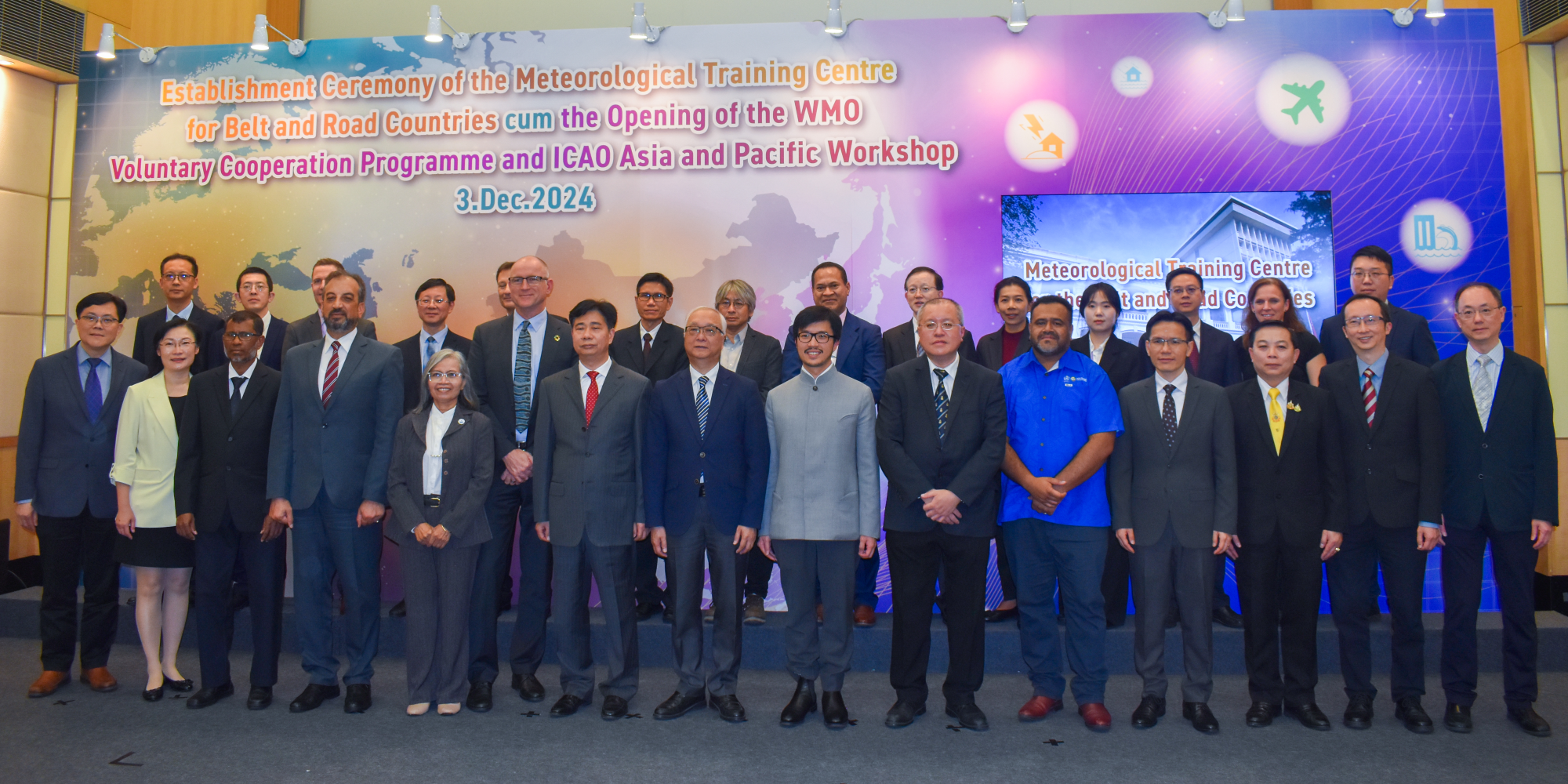 The Meteorological Training Centre for Belt and Road Countries was established today (December 3). Photo shows the Secretary for Environment and Ecology, Mr Tse Chin-wan (front row, centre); Deputy Administrator of the China Meteorological Administration Mr Xiong Shaoyuan (front row, seventh left); the Commissioner for Belt and Road, Mr Nicholas Ho (front row, seventh right); the Director of Regional Office for Asia and the South-West Pacific of the World Meteorological Organization, Mr Ben Churchill (front row, sixth left); the Advisor of the Ministry of Water Resources and Meteorology of Cambodia, Dr Seth Vannareth (front row, fifth left); the Director of Fiji Meteorological Service, Mr Misaeli Mavoa Funaki (front row, fifth right); the Director of Jordan Meteorological Department, Mr Ra'ed Ahmad Subhi Rafid (front row, fourth left); the Director of the Macao Meteorological and Geophysical Bureau, Mr Leong Weng-kun (front row, fourth right); the Director General of Maldives Meteorological Service, Mr Abdulla Wahid (front row, third left); Deputy Director-General of the Thai Meteorological Department Mr Thanasith Iamananchai (front row, third right); the Director of the Hong Kong Observatory, Dr Chan Pak-wai (front row, sixth right), and other guests at the establishment ceremony.