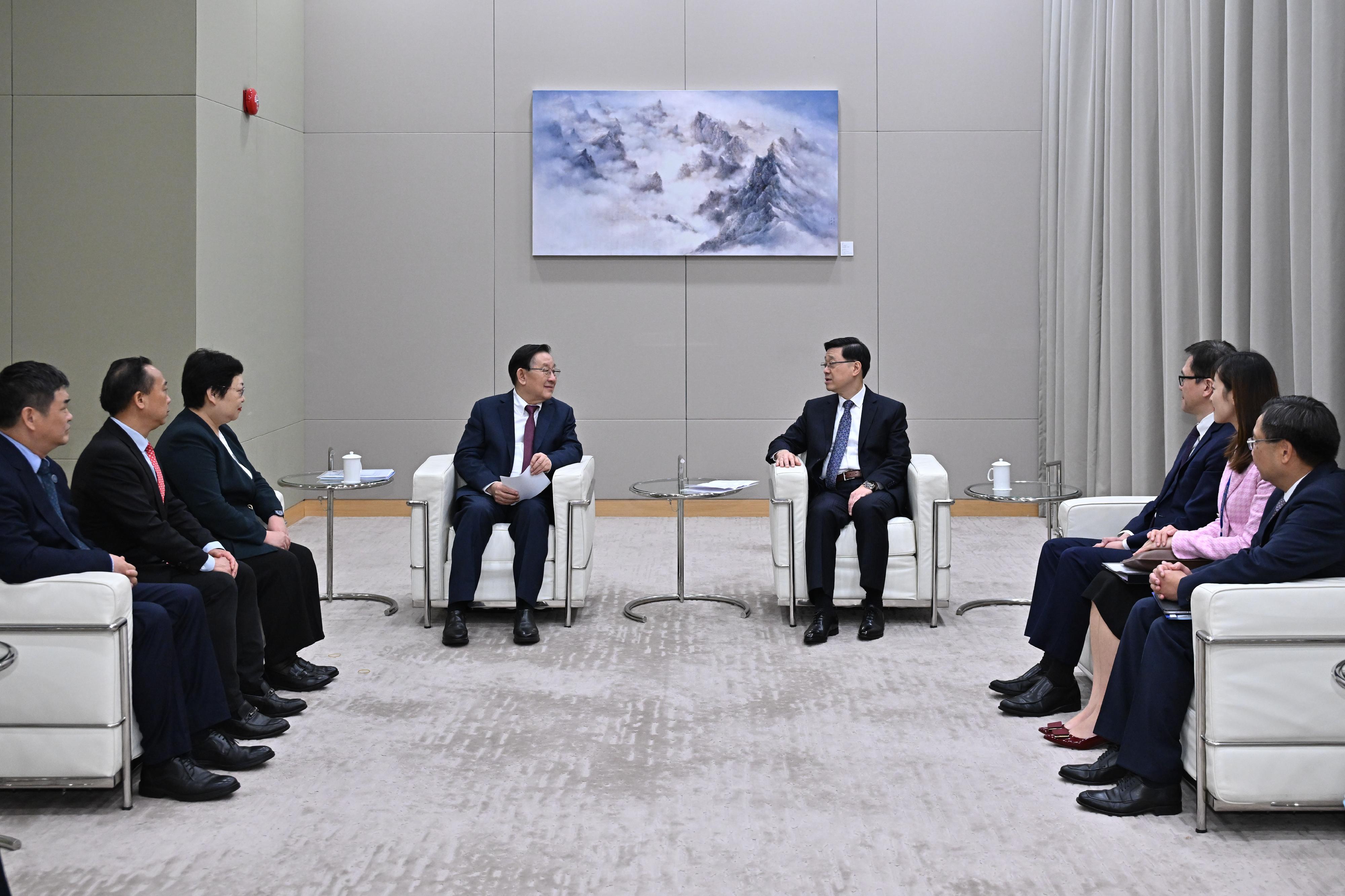 The Chief Executive, Mr John Lee, met with the visiting President of the China Association for Science and Technology (CAST), Mr Wan Gang, at the Central Government Offices today (December 3) to exchange views on the latest developments and opportunities for innovation and technology co-operation between the two places. Photo shows (from left) the President of Jinan University, Mr Xing Feng; Deputy Director-General of the Department of Educational, Scientific and Technological Affairs of the Liaison Office of the Central People's Government in the Hong Kong Special Administrative Region Mr Ye Shuiqiu; the Director of the Hong Kong, Macao and Taiwan Exchange Office of CAST, Ms Luo Hui; Mr Wan; Mr Lee; the Secretary for Innovation, Technology and Industry, Professor Sun Dong; the Under Secretary for Innovation, Technology and Industry, Ms Lillian Cheong; and the Commissioner for Innovation and Technology, Mr Ivan Lee, at the meeting.