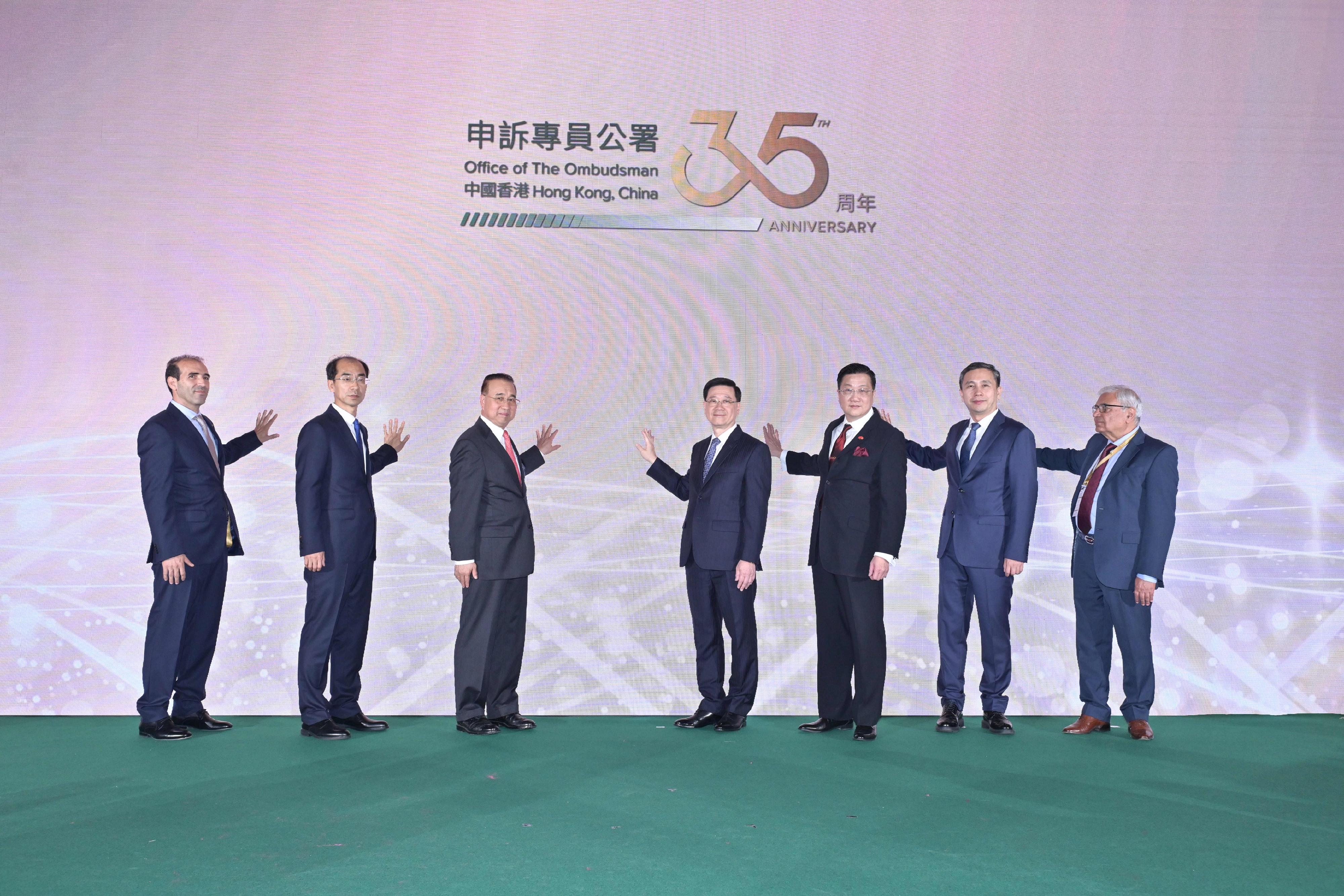 The Chief Executive, Mr John Lee, today (December 3) attended the International Ombudsman Summit 2024 Closing Ceremony and Hong Kong Ombudsman 35th Anniversary Reception. Photo shows (from left) the First Vice President of the International Ombudsman Institute, Mr Mohamed Benalilou; Deputy Commissioner of the National Public Complaints and Proposals Administration Mr Li Zijun; Deputy Director of the Liaison Office of the Central People's Government in the Hong Kong Special Administrative Region Mr Liu Guangyuan; Mr Lee; the Ombudsman, Mr Jack Chan; the Director-General of the Department of International Cooperation of the National Commission of Supervision, Mr Cai Wei; and the President of the Asian Ombudsman Association, Mr Ejaz Ahmad Qureshi at the event.