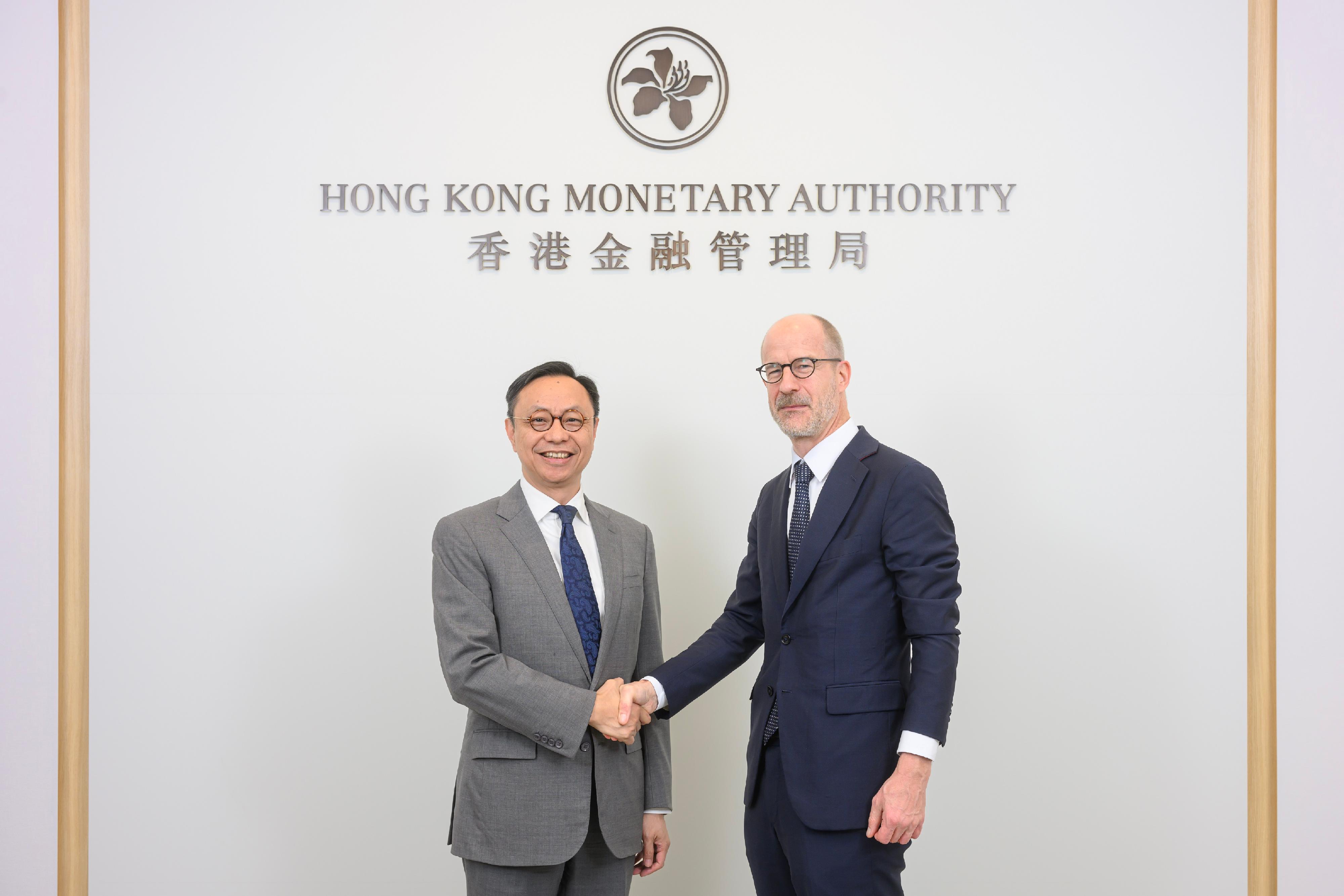 Deputy Chief Executive of the Hong Kong Monetary Authority Mr Darryl Chan (left) and the Deputy State Secretary and Head of the Planning and Strategy of the State Secretariat for International Finance, Mr Christoph König (right), chaired the seventh Hong Kong-Switzerland Financial Dialogue todaty (December 4).