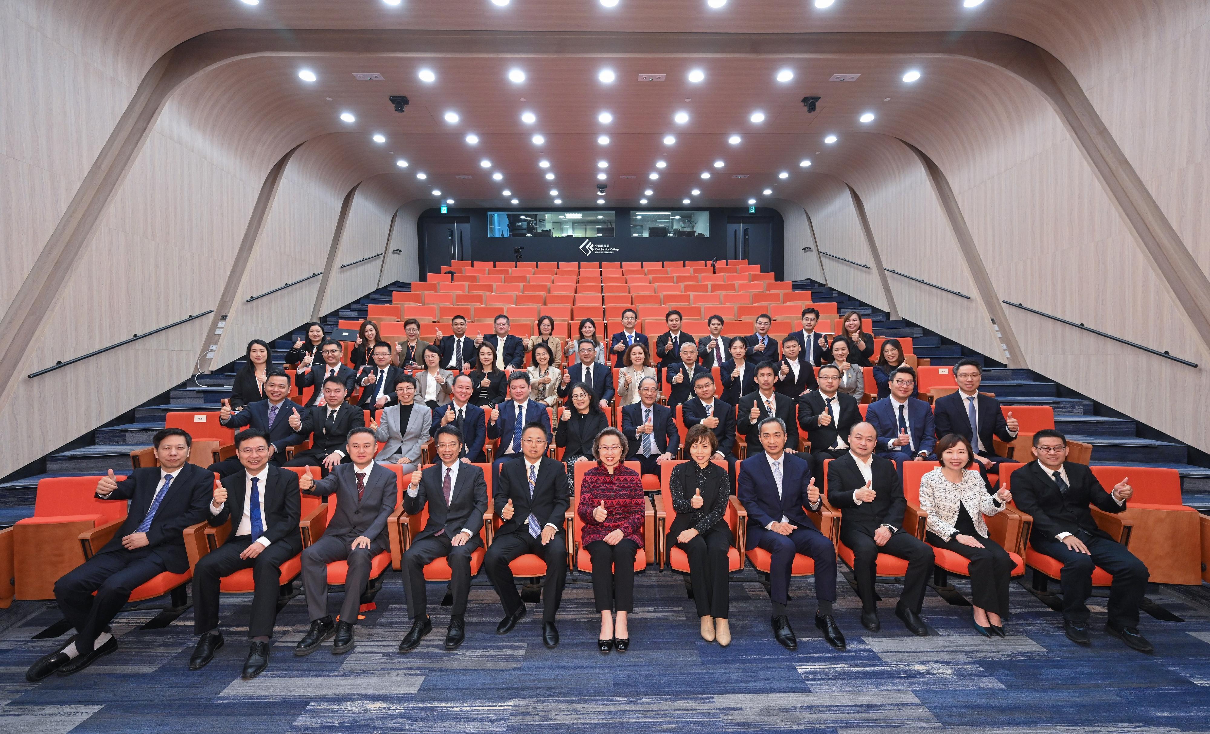 The Hong Kong Special Administrative Region (HKSAR) Government has launched the Civil Service Exchange Programme in collaboration with Beijing, Shanghai, Chongqing, Wuhan and Hangzhou, as well as Mainland cities in the Guangdong-Hong Kong-Macao Greater Bay Area. Starting from the beginning of this month, the programme is hosting 30 Mainland officials in Hong Kong for an exchange in the HKSAR Government, lasting from four weeks to three months. The Secretary for the Civil Service, Mrs Ingrid Yeung, attended the orientation programme for Mainland officials participating in the exchange programme today (December 5) and met with the participants.  Photo shows Mrs Yeung (first row, centre); the Permanent Secretary for the Civil Service, Mr Clement Leung (first row, fourth left); and the Head of the Civil Service College, Mr Oscar Kwok (first row, fourth right), with the participating Mainland civil servants and others.