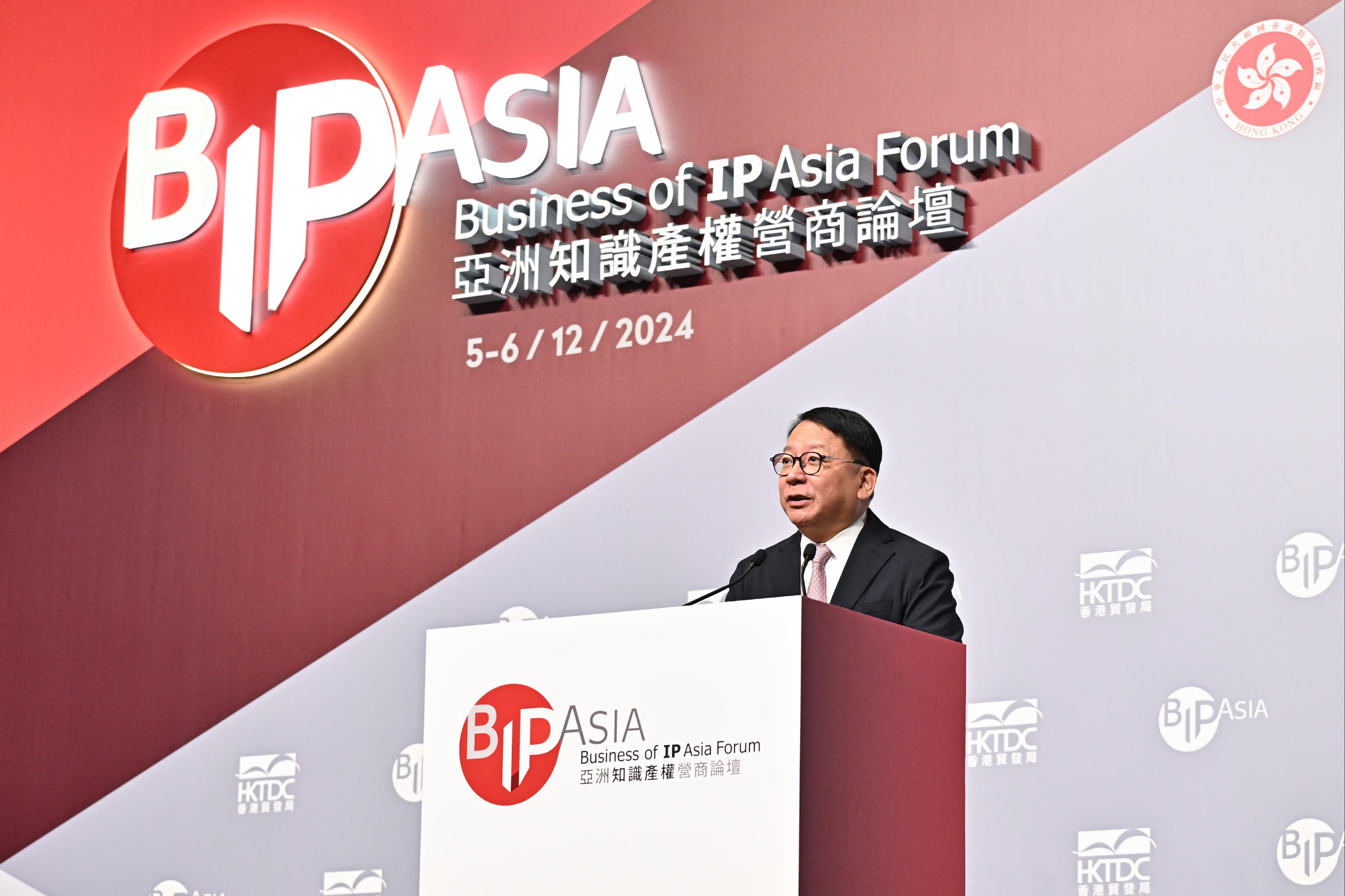 The Chief Secretary for Administration, Mr Chan Kwok-ki, speaks at the Business of Intellectual Property Asia Forum today (December 5).