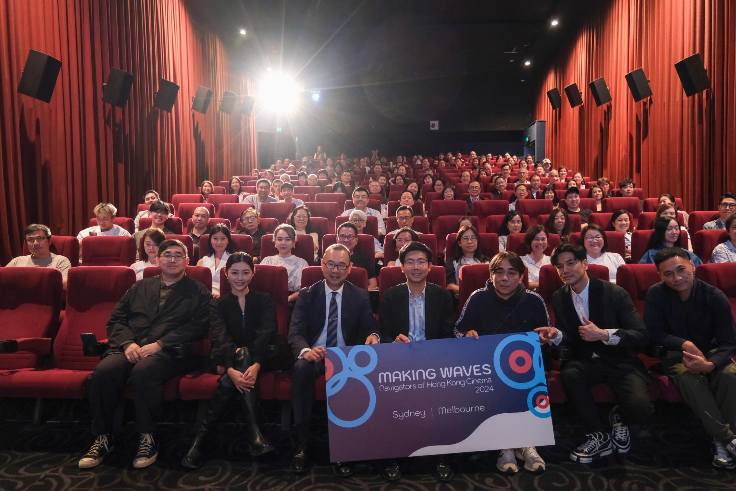 "Making Waves - Navigators of Hong Kong Cinema" is being held in Australia, showcasing six new and restored Hong Kong films to film lovers in Australia. Photo shows (first row, from left) director Anselm Chan; actress Michelle Wai; Councillor of City of Sydney Mr Robert Kok; the Acting Director of the Hong Kong Economic and Trade Office, Sydney, Mr Timothy Chau; member of the Hong Kong Film Development Council Mr Tang Wai-but; actor Philip Ng; and director Terry Ng with the audience before the screening of "The Last Dance" in Sydney on November 28.