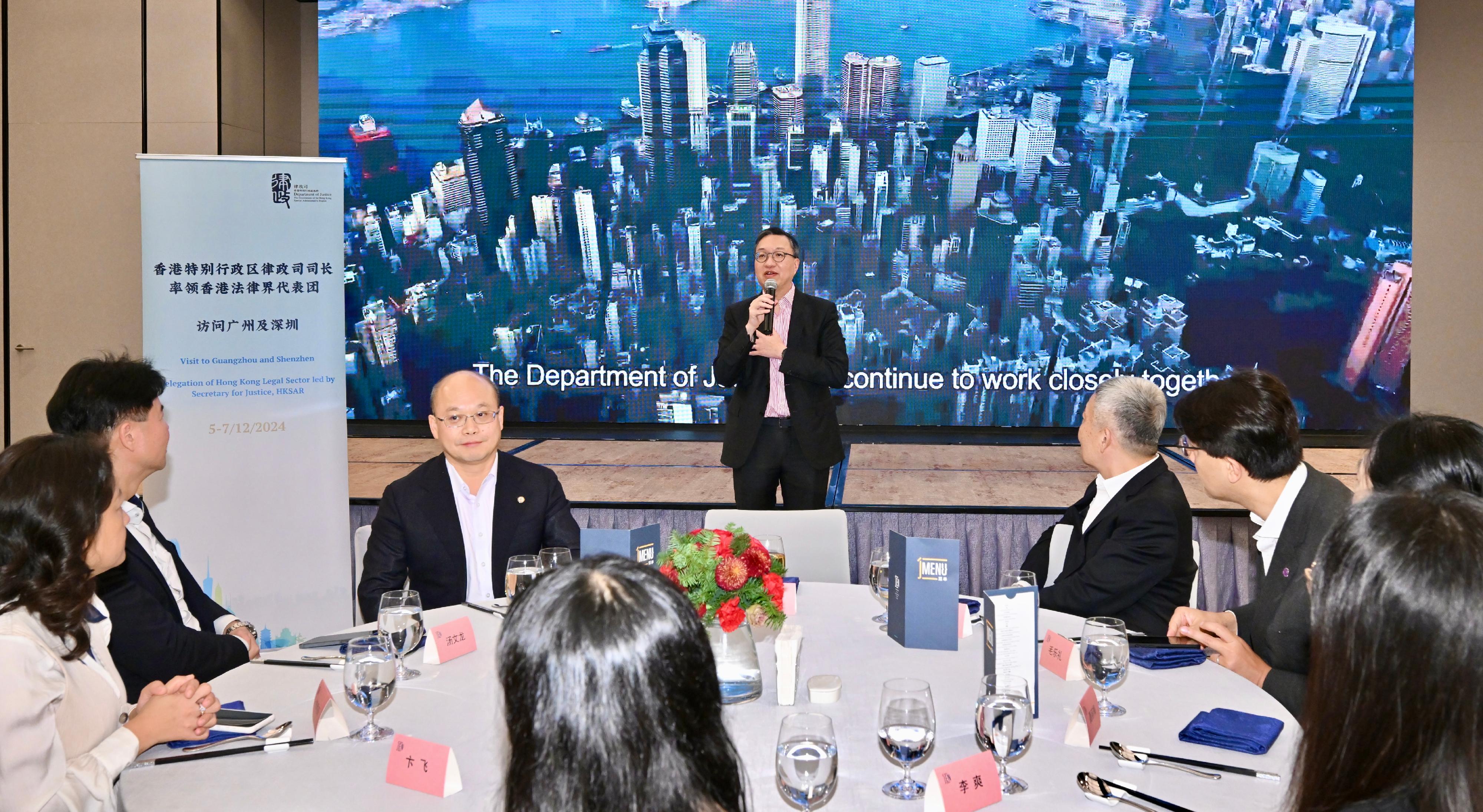 The Secretary for Justice, Mr Paul Lam, SC, leading a Hong Kong delegation of over 30 representatives of foreign-related legal talent from Hong Kong, departed for Shenzhen today (December 6) to continue his visit to Mainland cities of the Guangdong-Hong Kong-Macao Greater Bay Area. Photo shows Mr Lam speaking at the dinner for the delegation and the Shenzhen legal sector.

