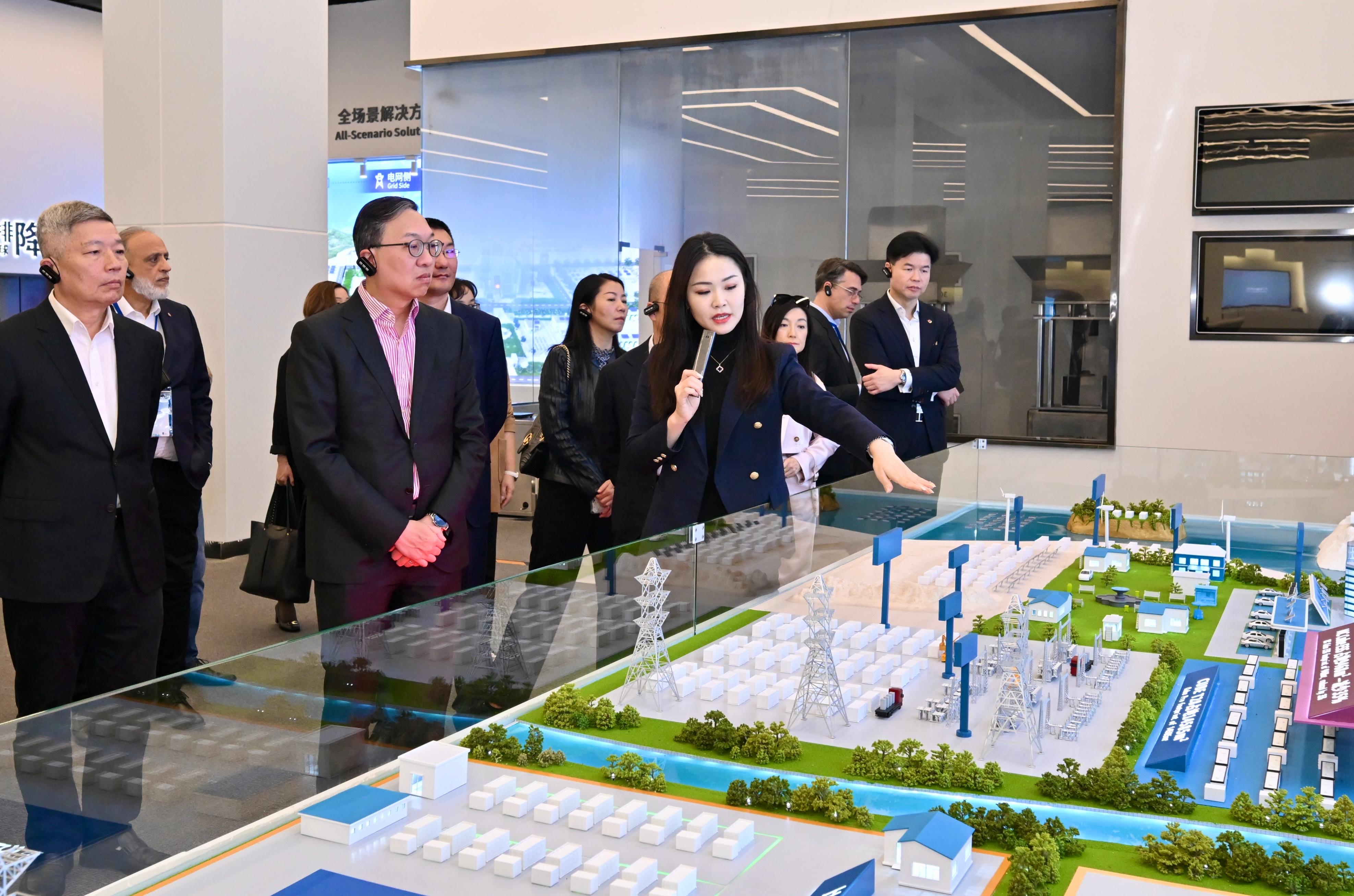 The Secretary for Justice, Mr Paul Lam, SC, leading a Hong Kong delegation of over 30 representatives of foreign-related legal talent from Hong Kong, continues his visit in the Guangdong-Hong Kong-Macao Greater Bay Area in Shenzhen on December 7. Photos shows Mr Lam (second left) and the delegation visiting BYD Company Limited's headquarters in Shenzhen to learn about the latest developments of the company and its demand for cross-border legal services. 
